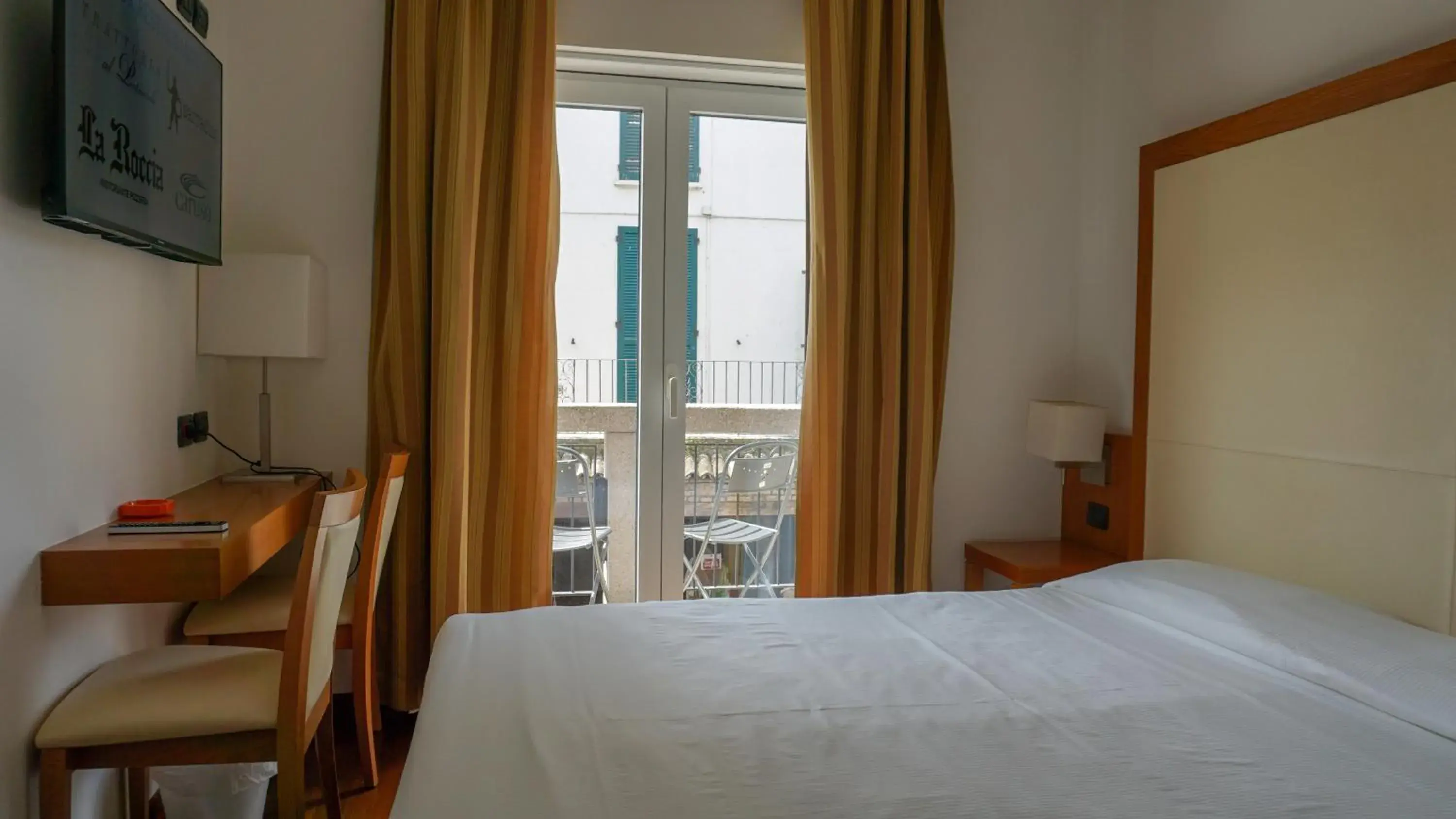 Family Room with Balcony and City View in Hotel Mavino Family Room with Balcony and City View in Hotel Mavino