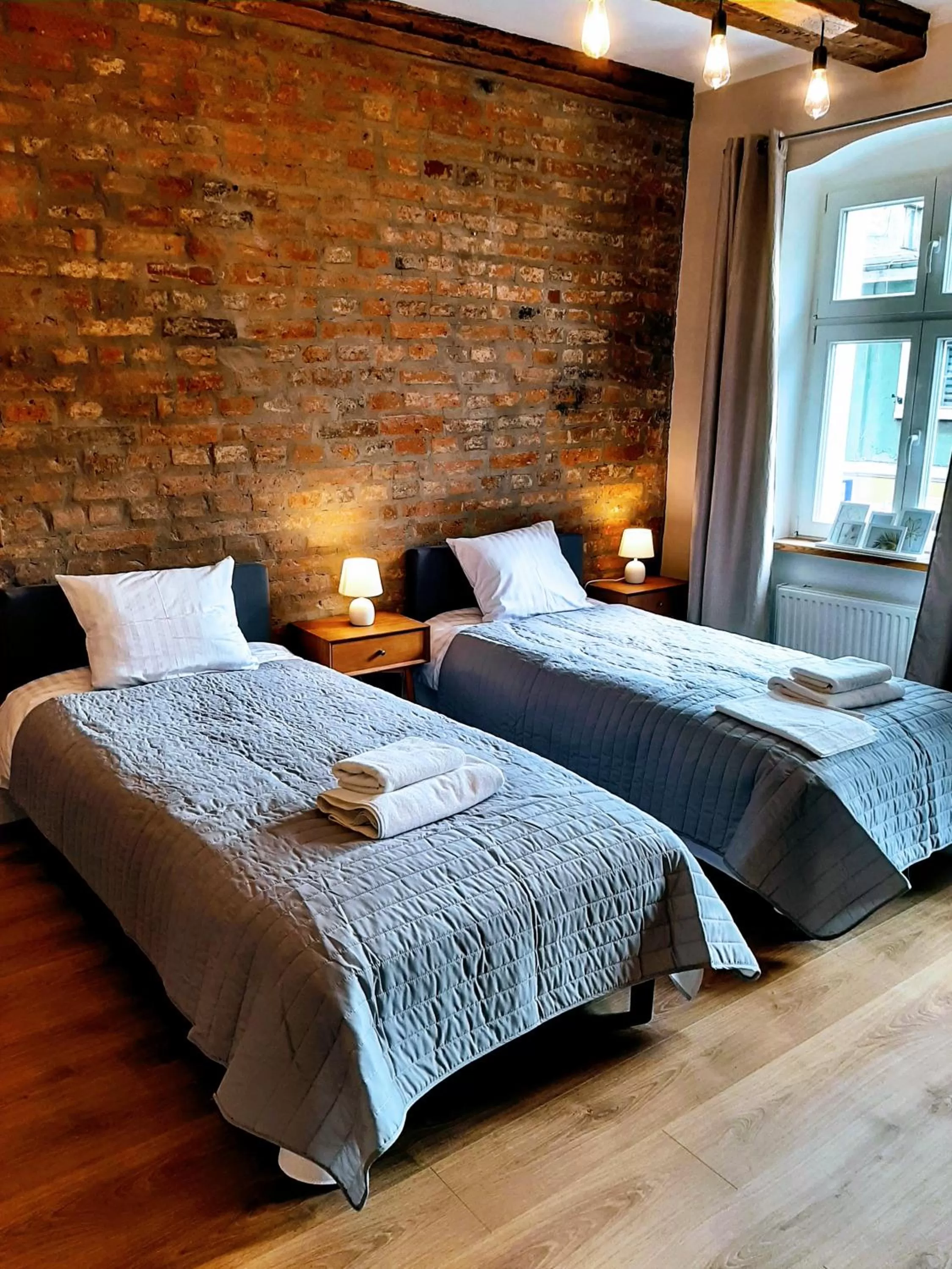 Bed in Drzewna Apartamenty - Kupiecka 5