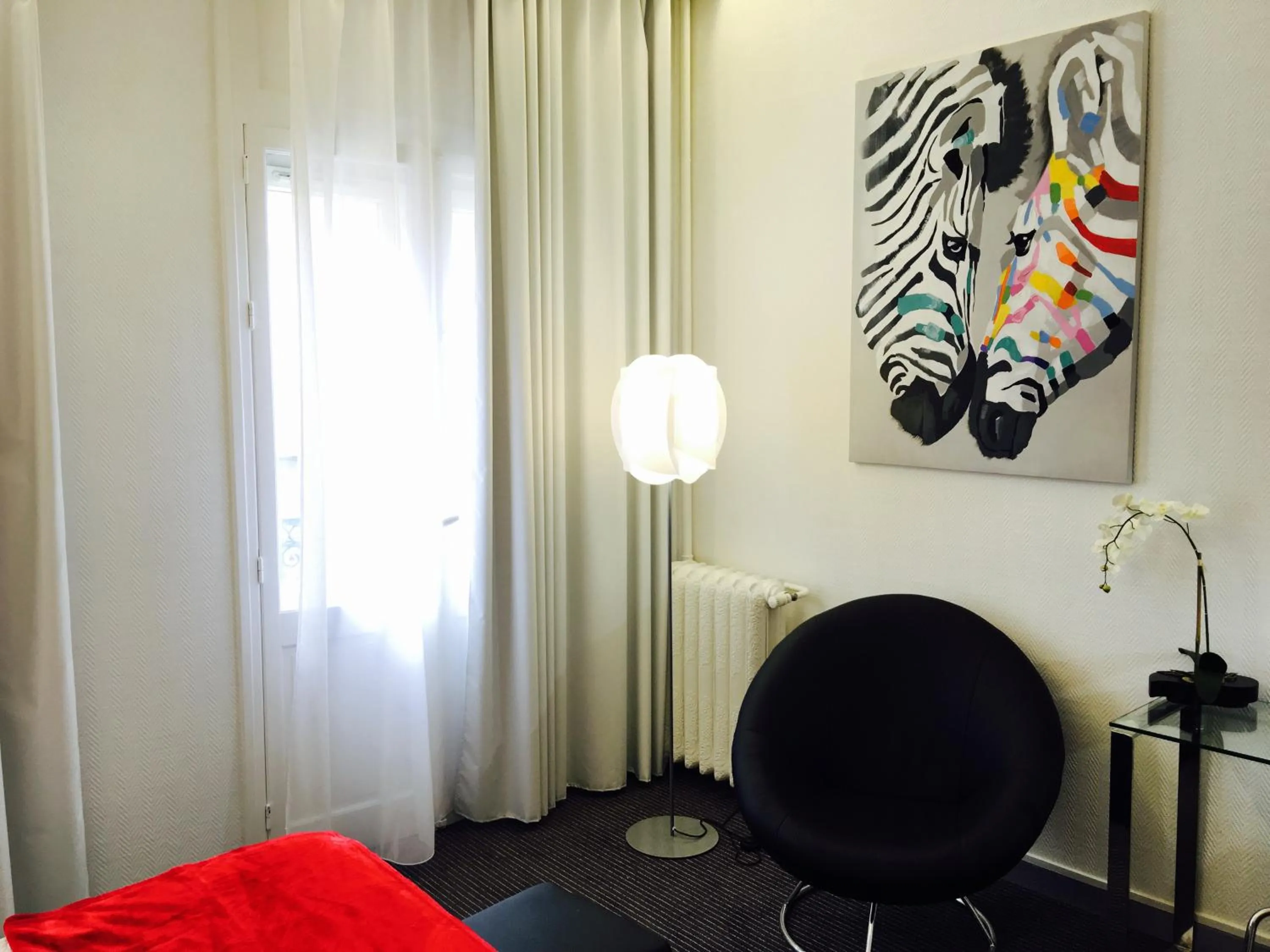 Photo of the whole room in Hôtel Le Capitole