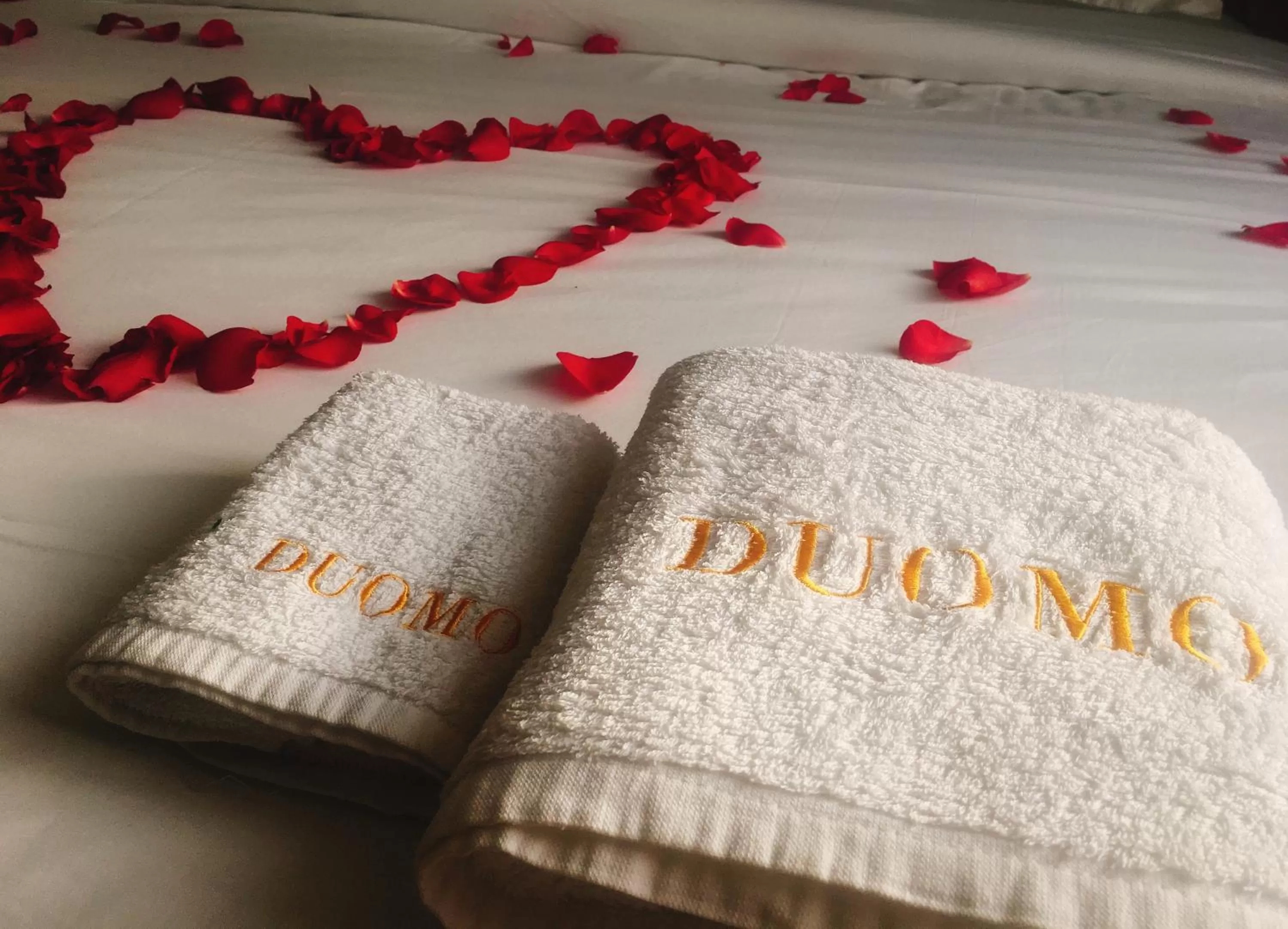 towels, Bed in Hotel Duomo and Suites