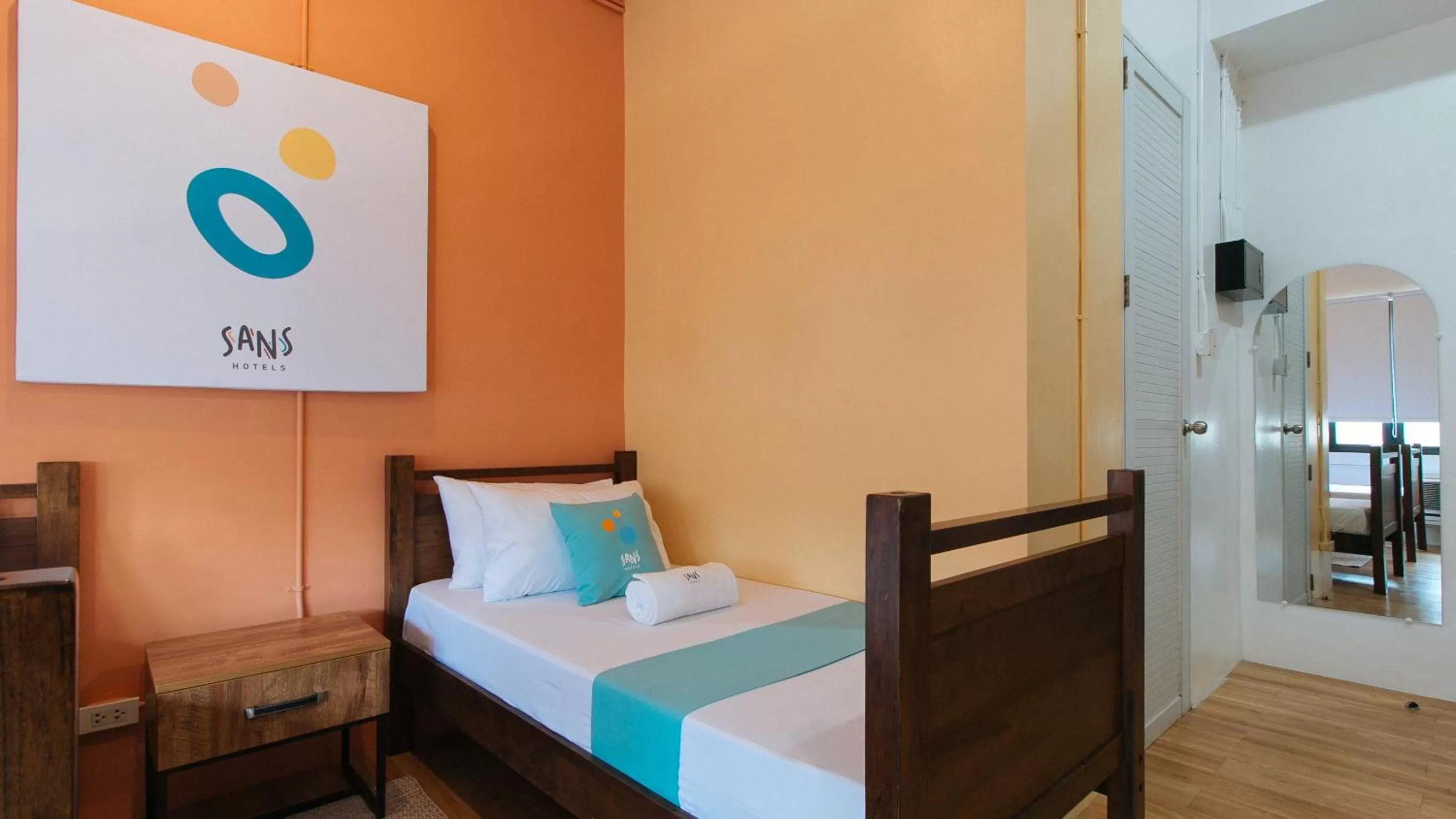 Bed in Sans Hotel Laperal Manila