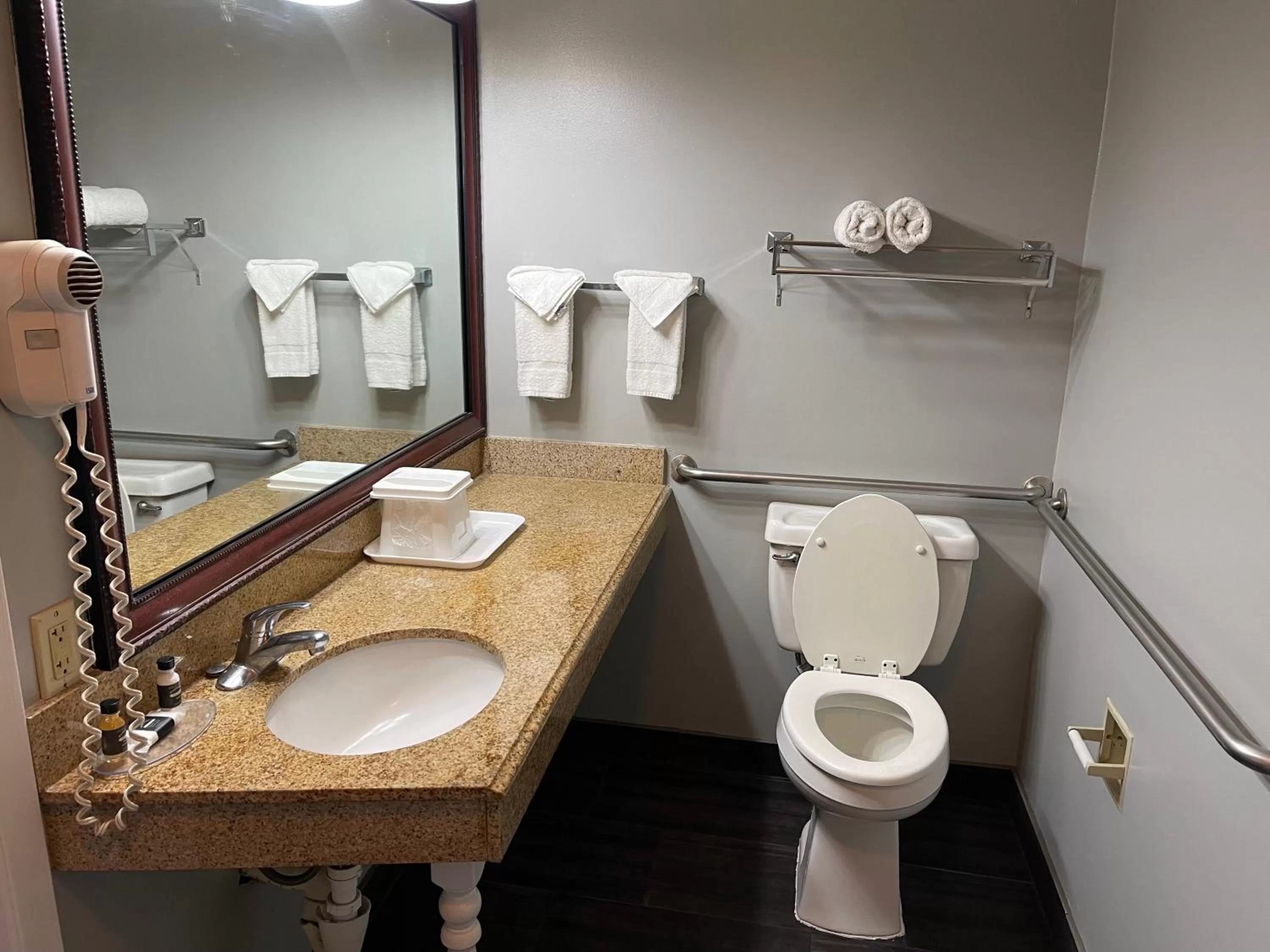 Bathroom in Super 6 Inn & Suites