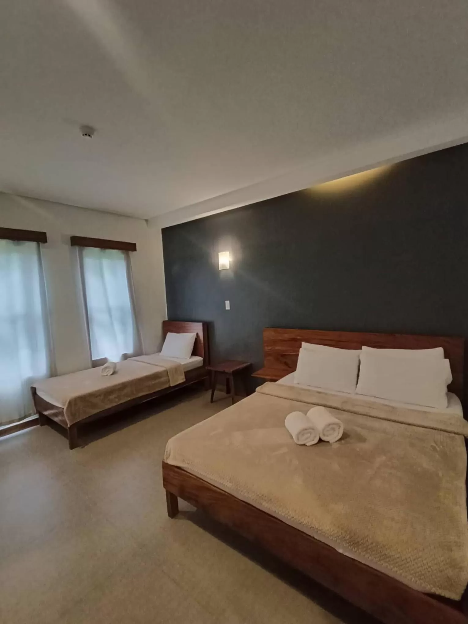 Photo of the whole room, Bed in Acacia Garden Inn and Suites