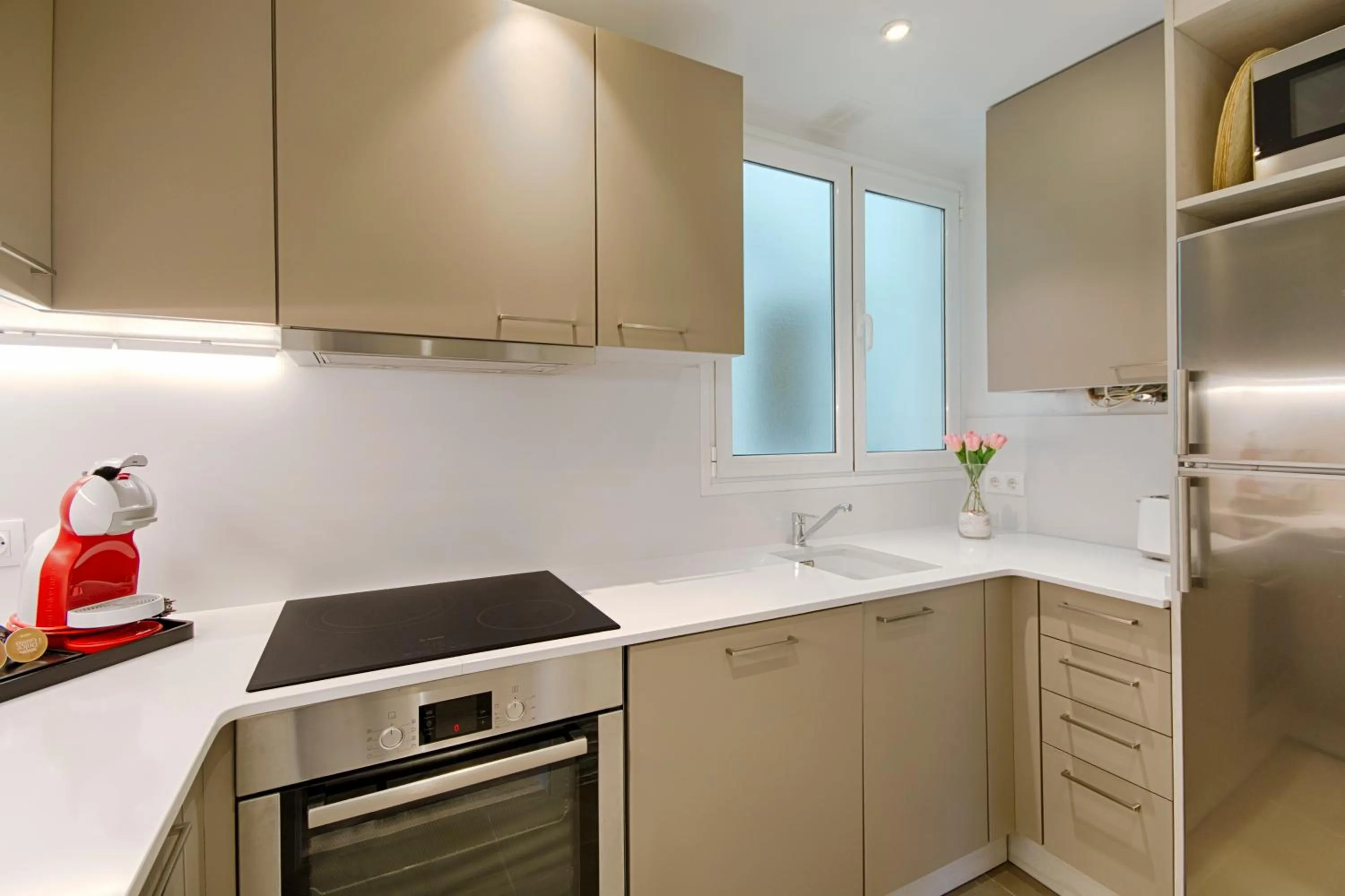 Coffee/tea facilities in Eixample Building Apartments by Mercedes Heritage