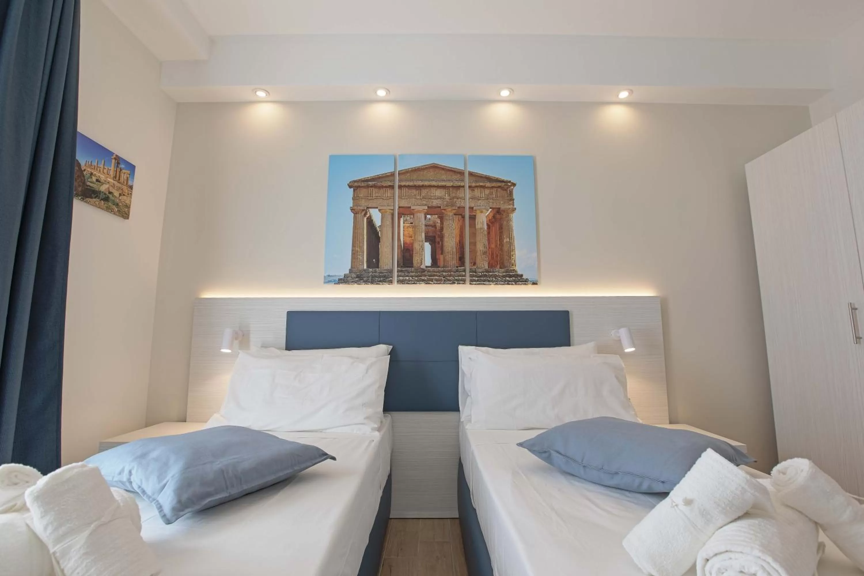 Bed in Esseneto Rooms