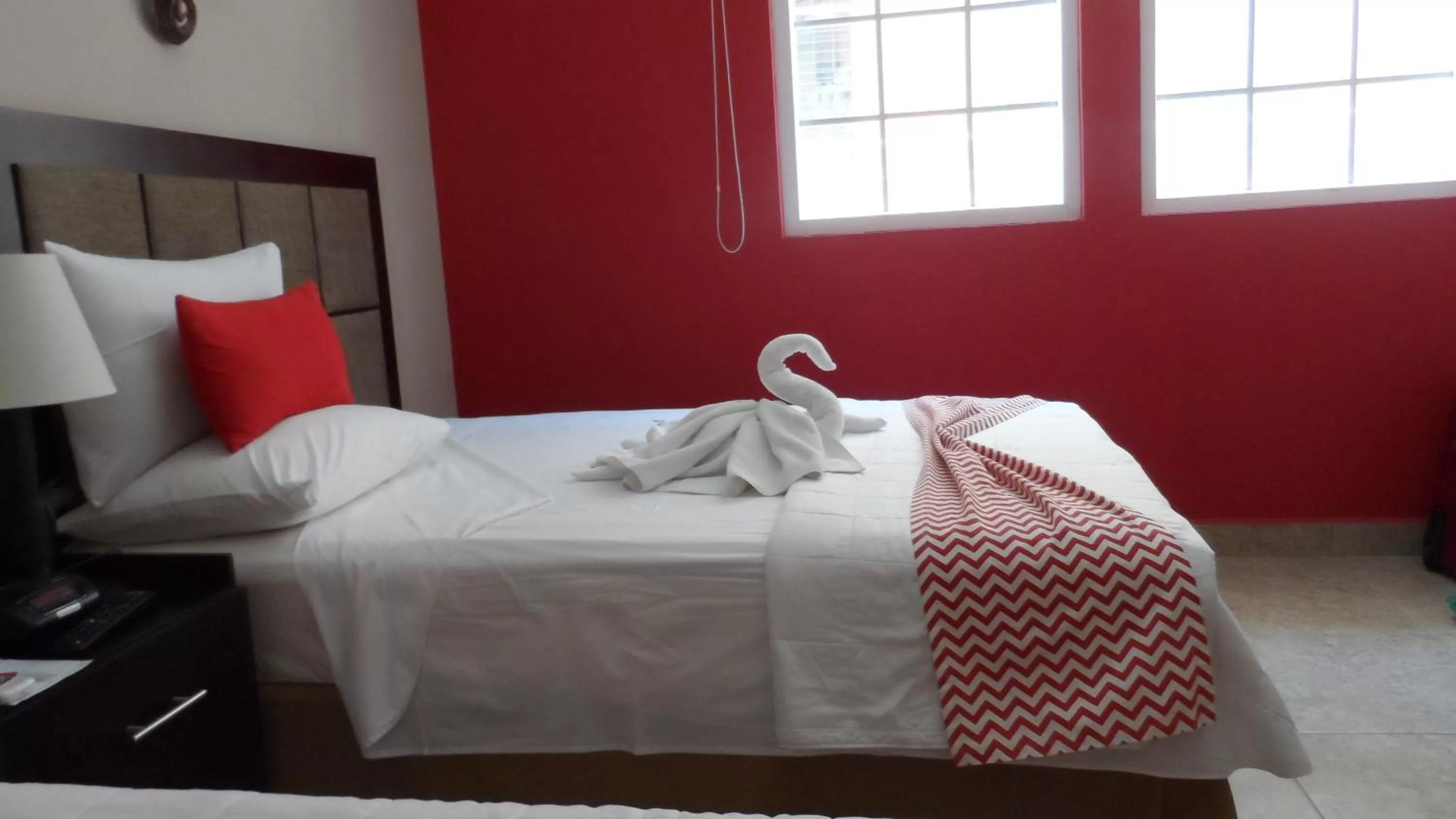 Photo of the whole room, Bed in Ramada by Wyndham Tikal Isla de Flores