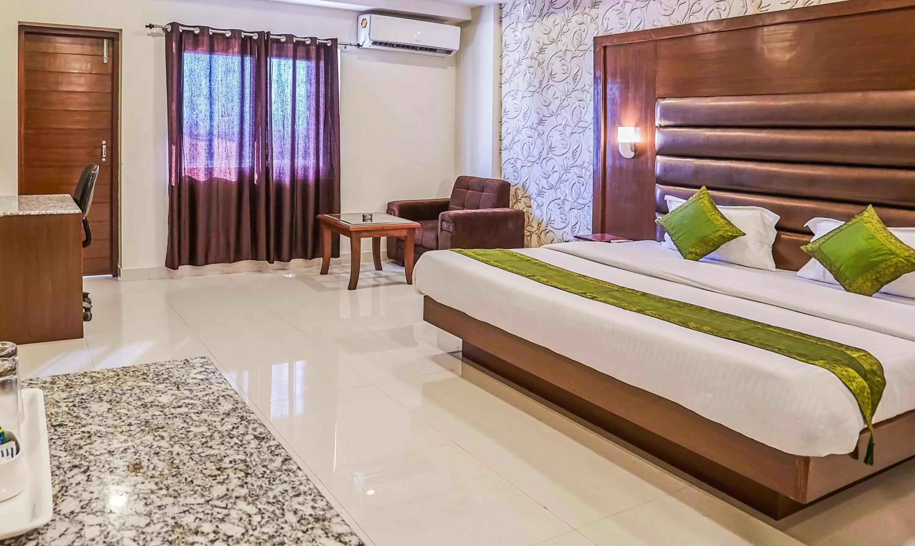 Bedroom, Bed in Treebo Grand Legacy Elite With Roof Top Cafe