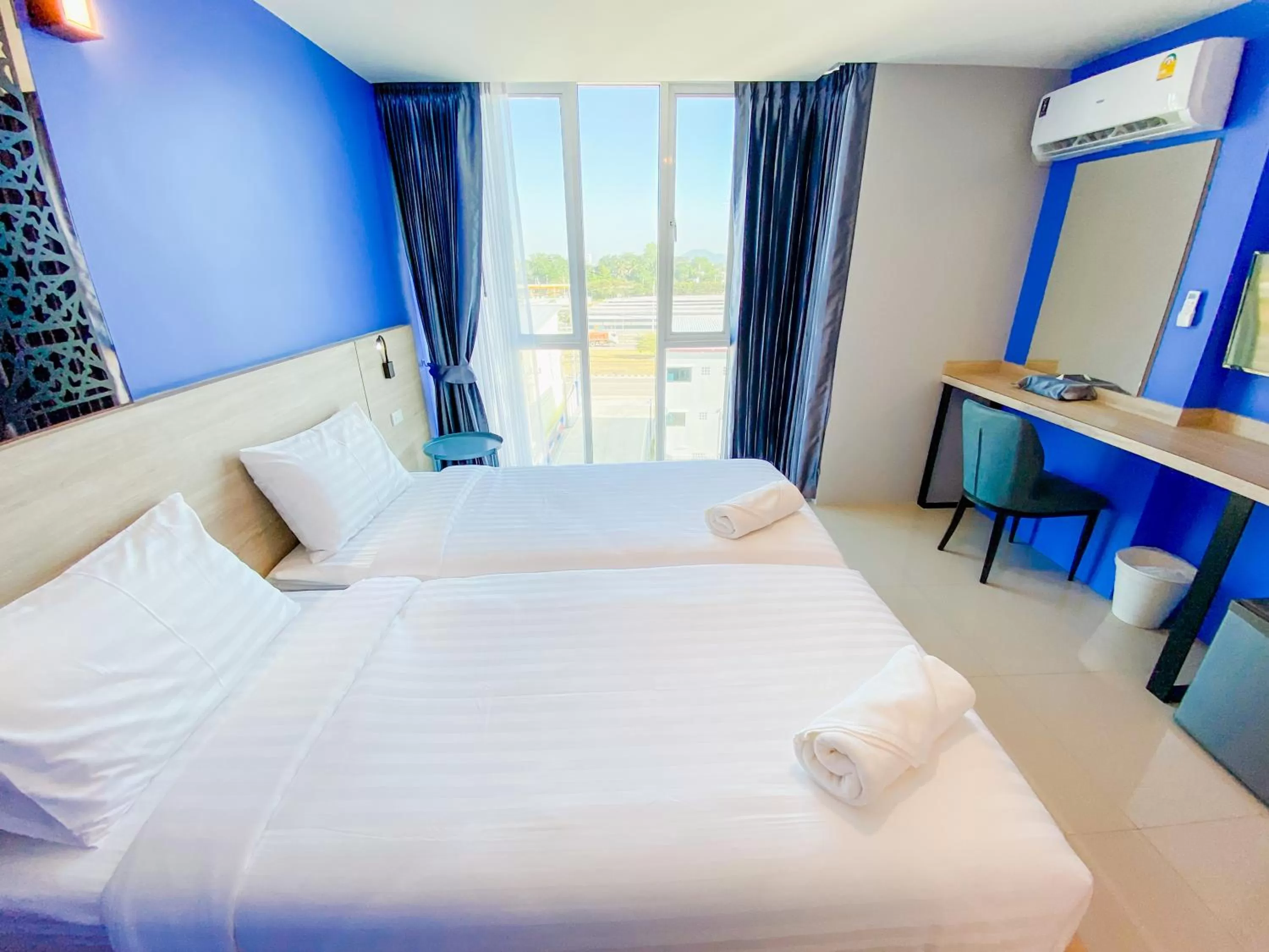 Bed in วัน บัดเจท เชียงราย สนามบิน One Budget Hotel Chiangrai Airport