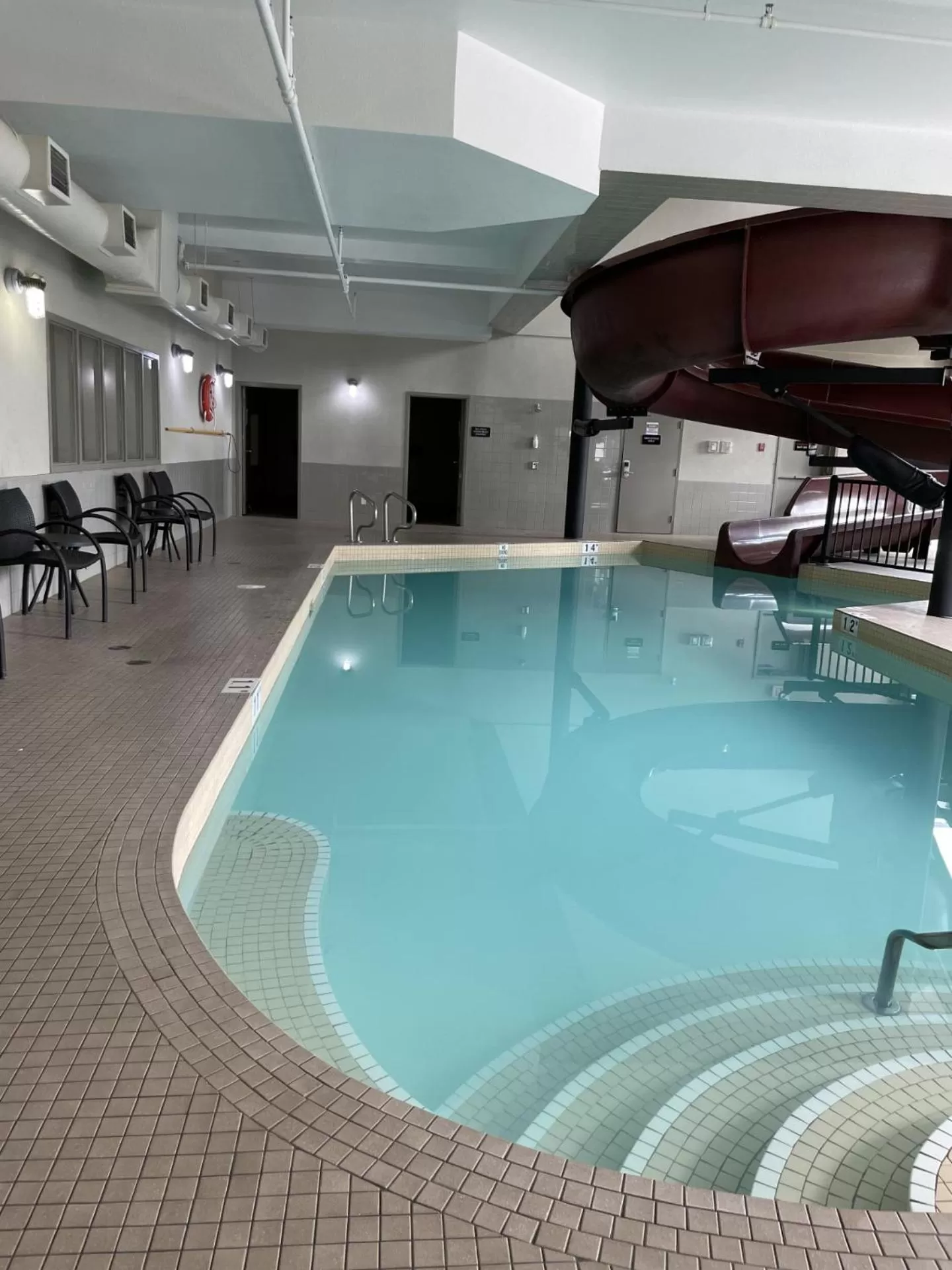 Swimming pool in Ramada by Wyndham Airdrie Hotel & Suites
