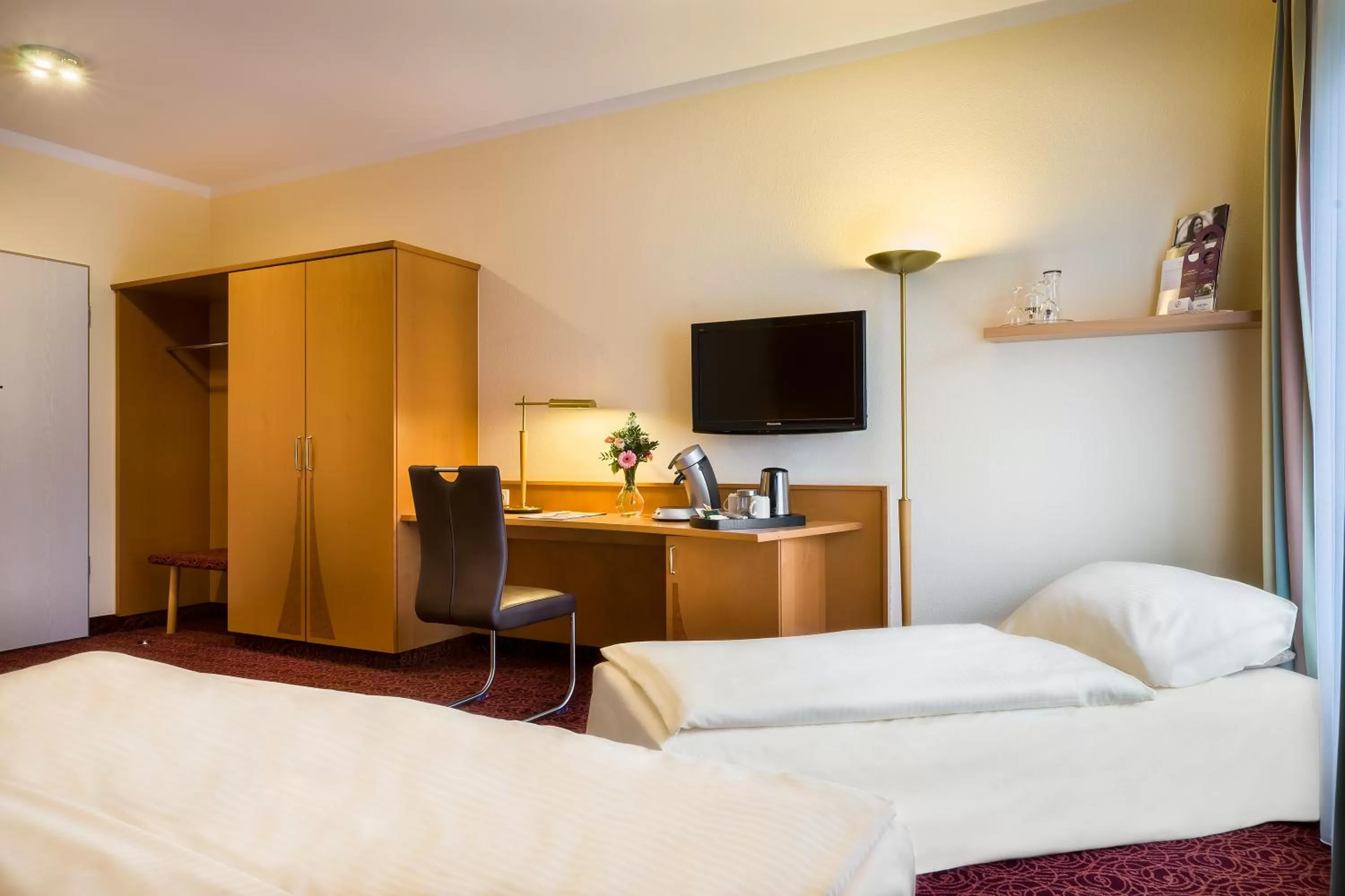 Photo of the whole room, Bed in Mercure Hotel Ingolstadt
