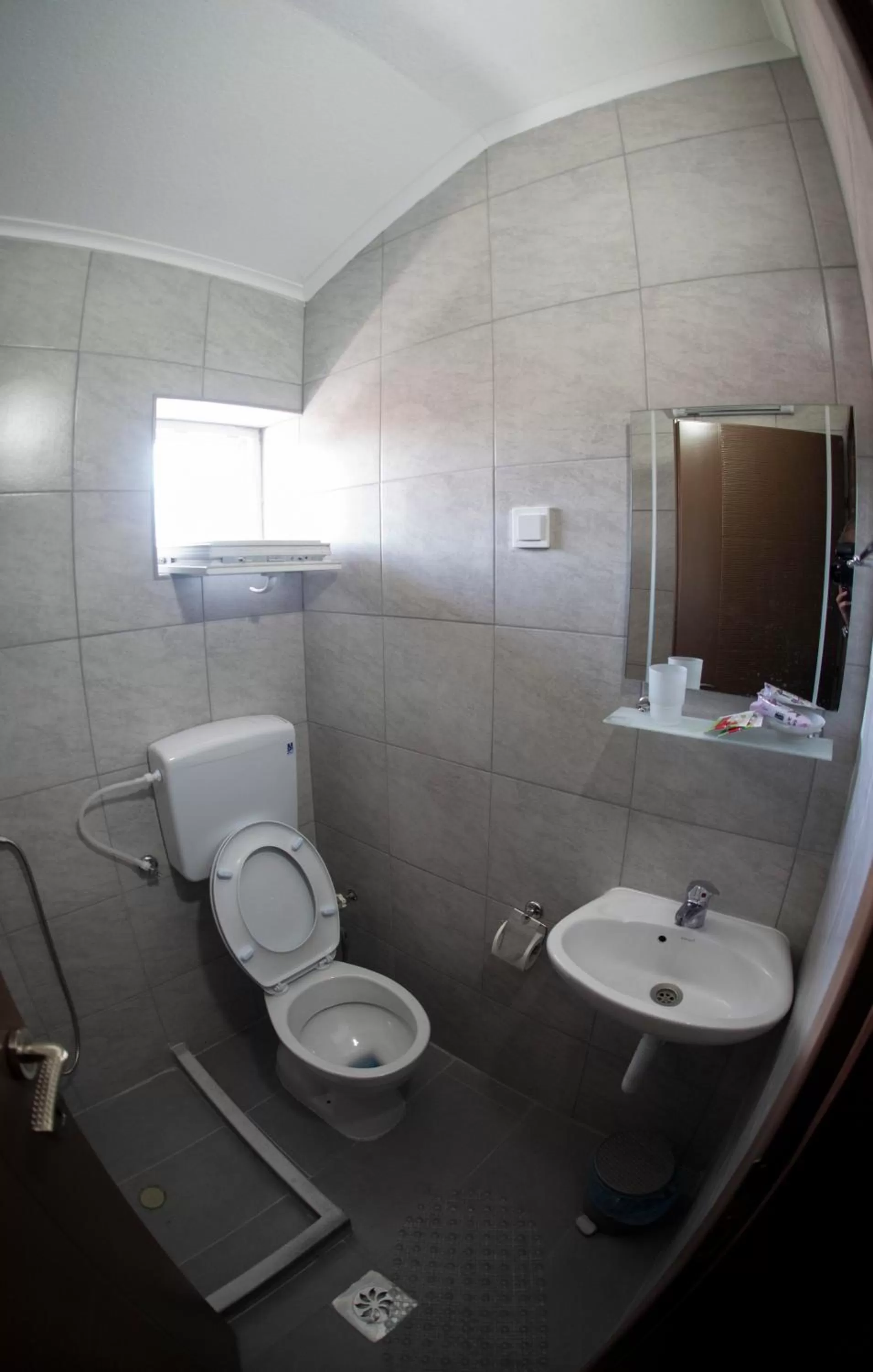 Bathroom in DIONIS Rooms & Apartments