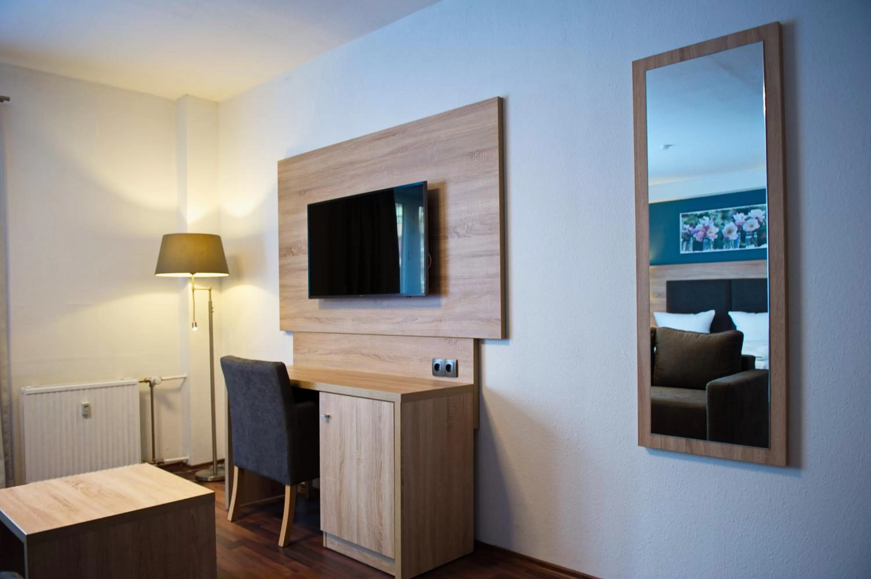 Photo of the whole room, TV/Entertainment Center in BlnCty Hotel