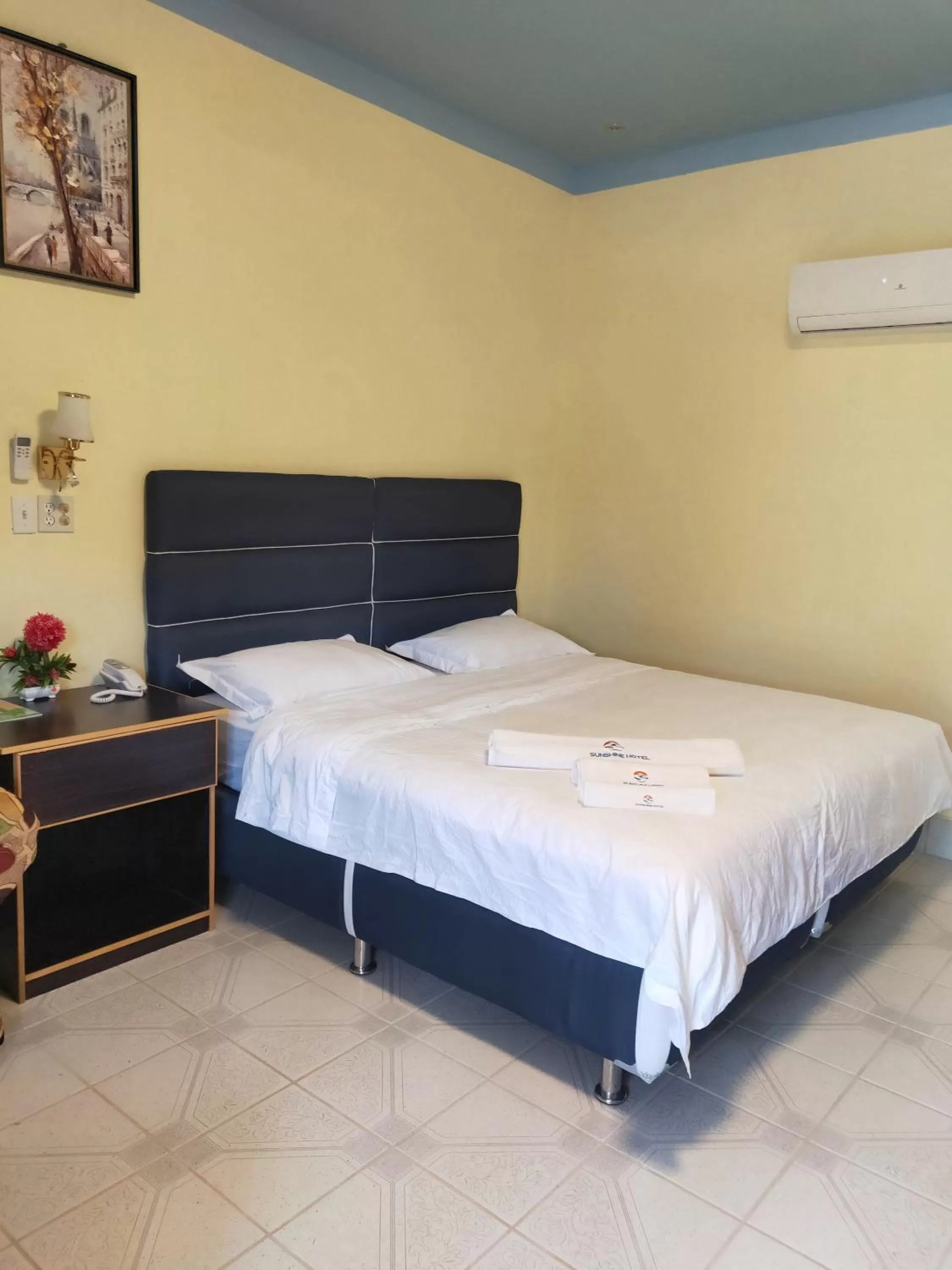 Bed in Sunshine View Hotel and Restaurant