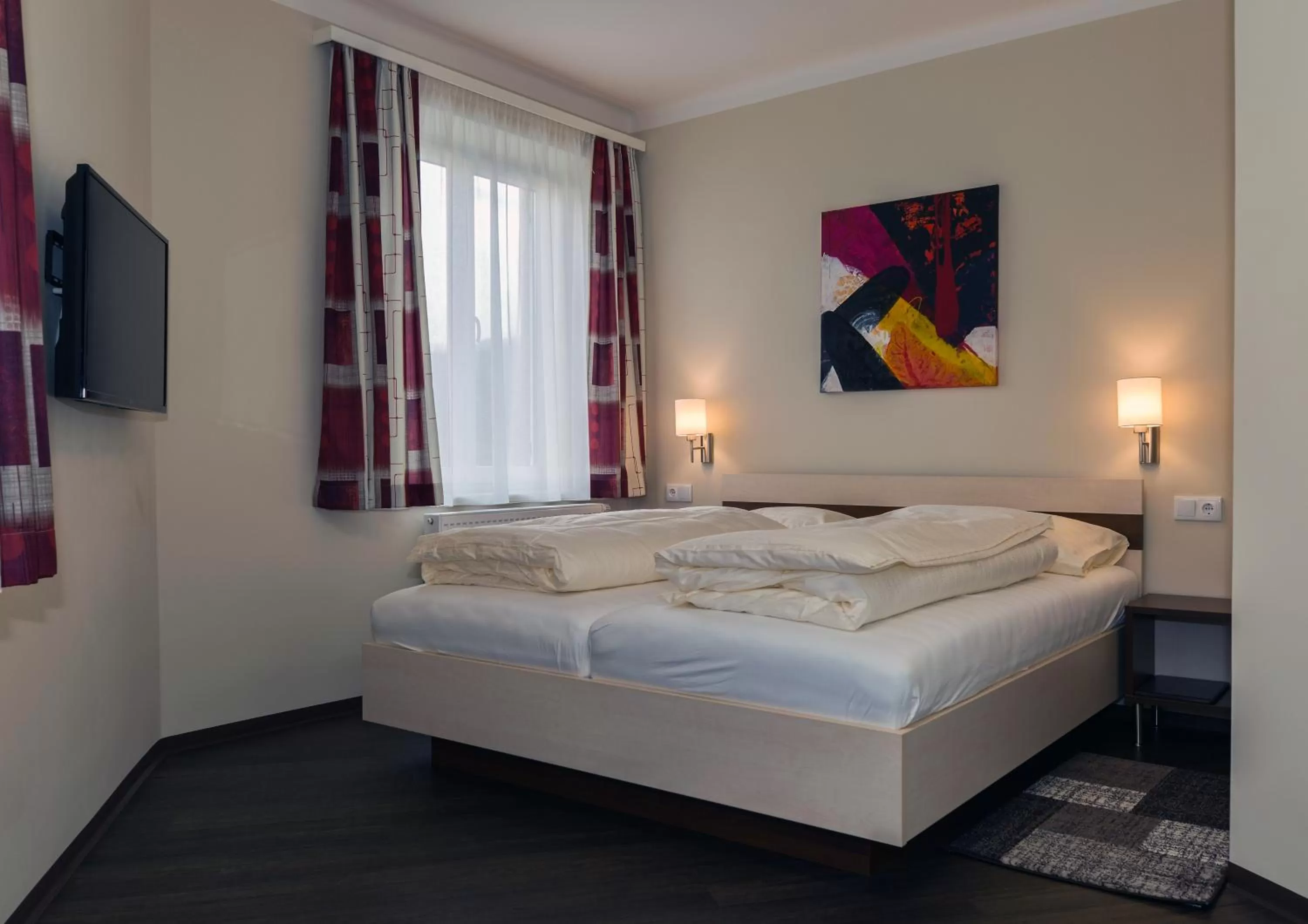 Bed in Hotel Guidassoni