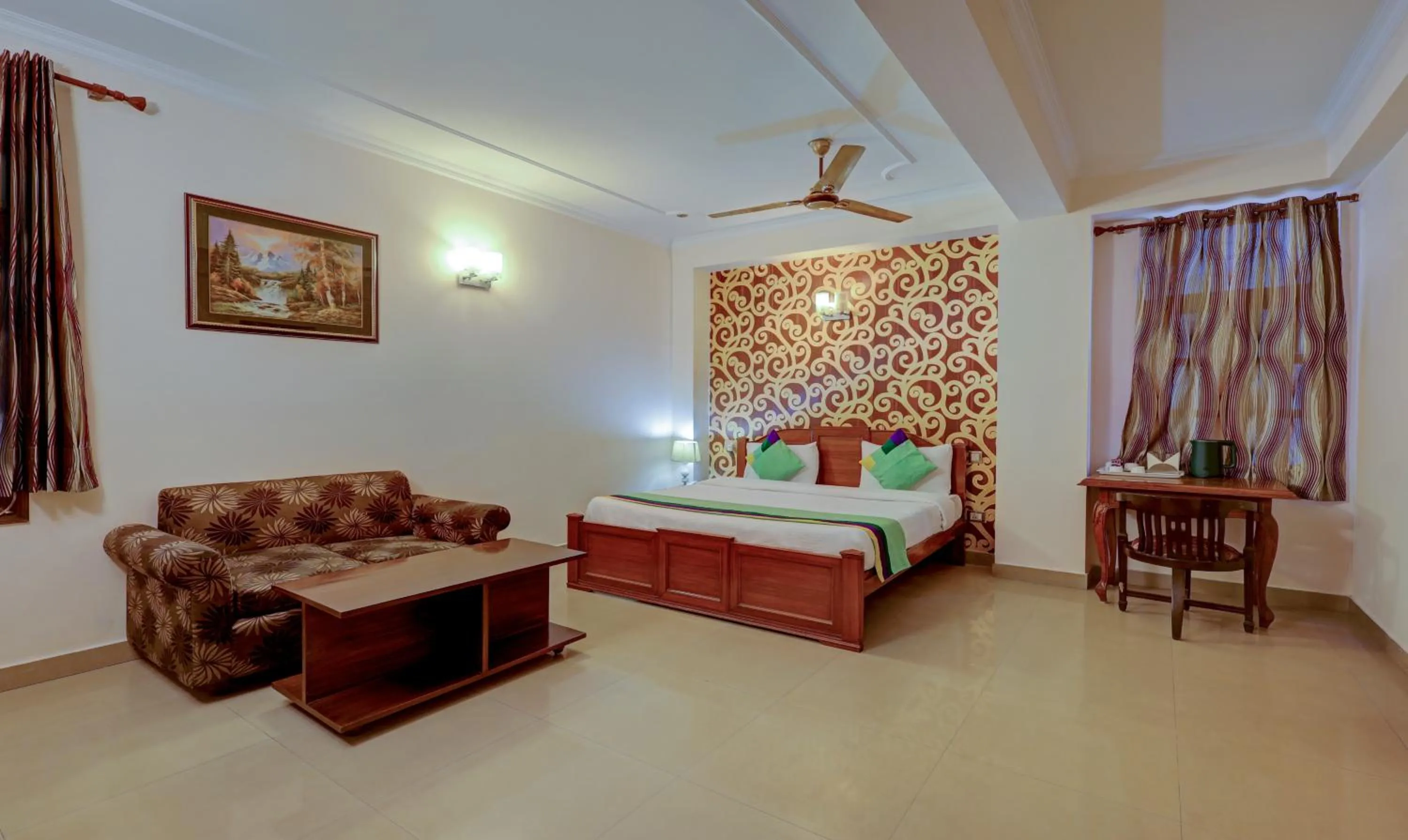 Seating area, Bed in Treebo Primeone