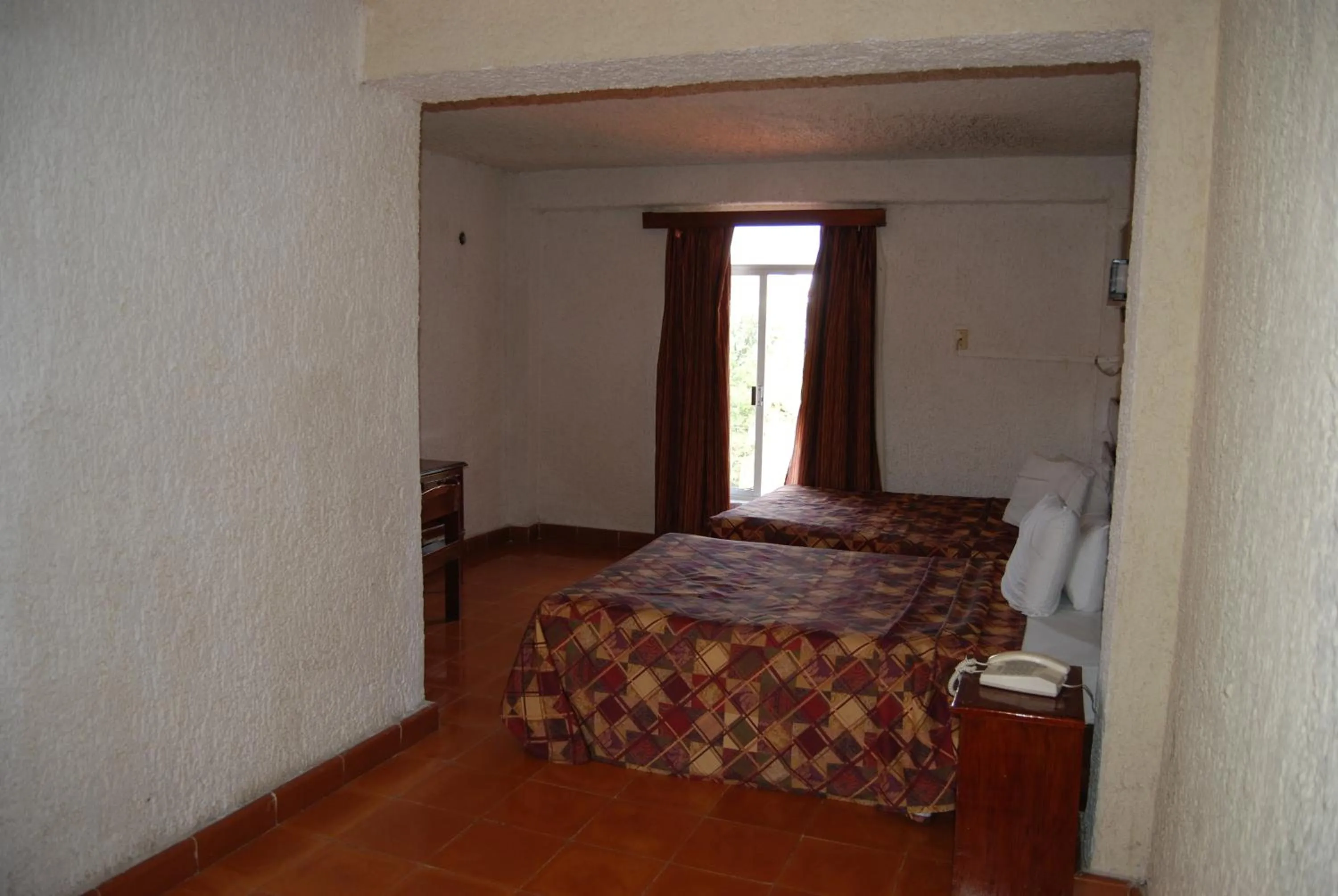 Photo of the whole room, Bed in Hotel Tankah Cancun