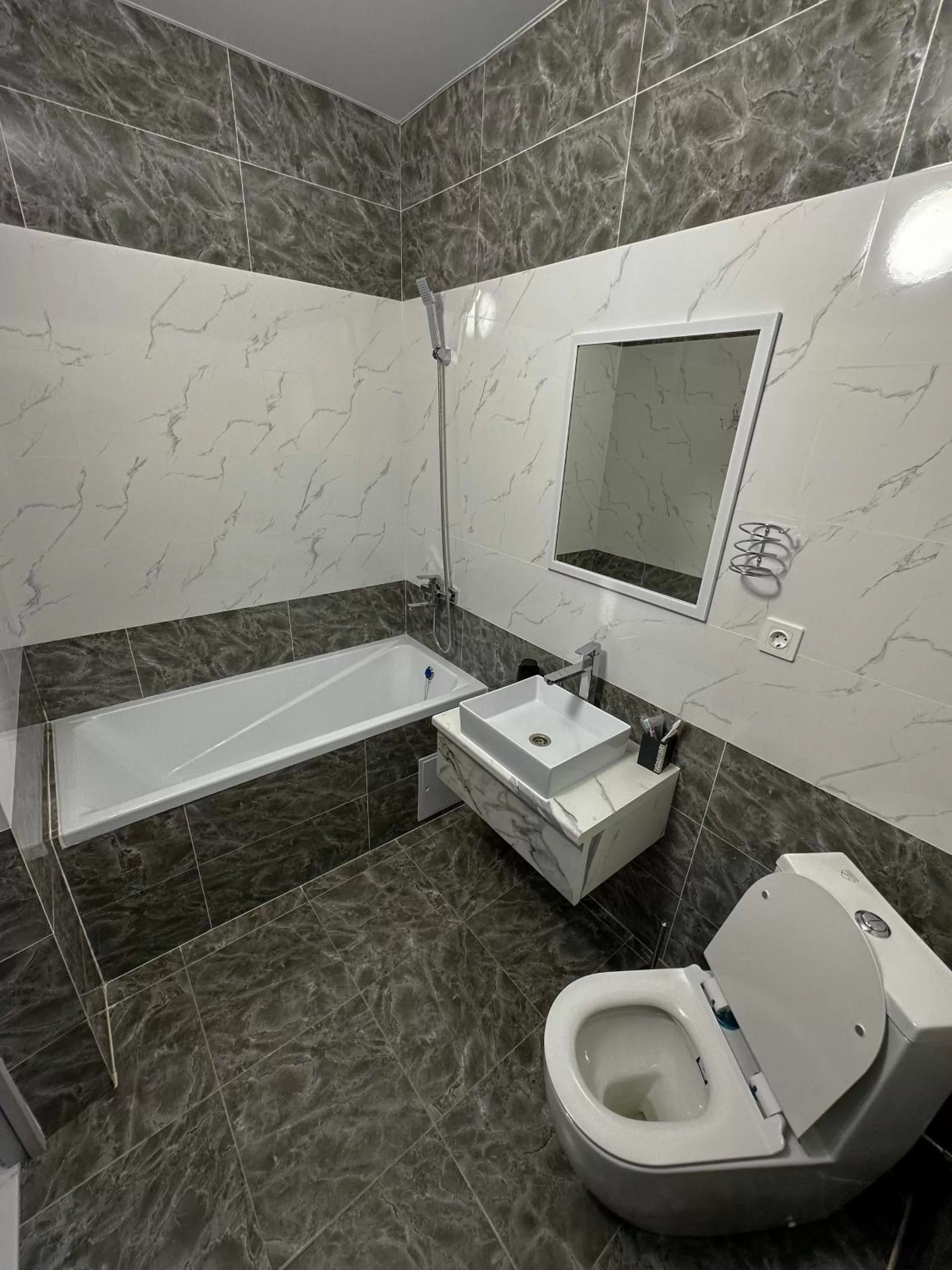 Bathroom in Astina Hotel