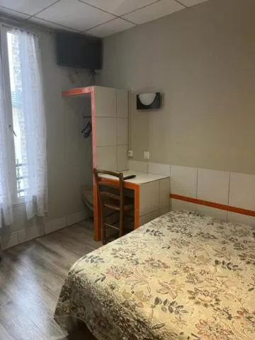 Bed in Hôtel Jarry Confort