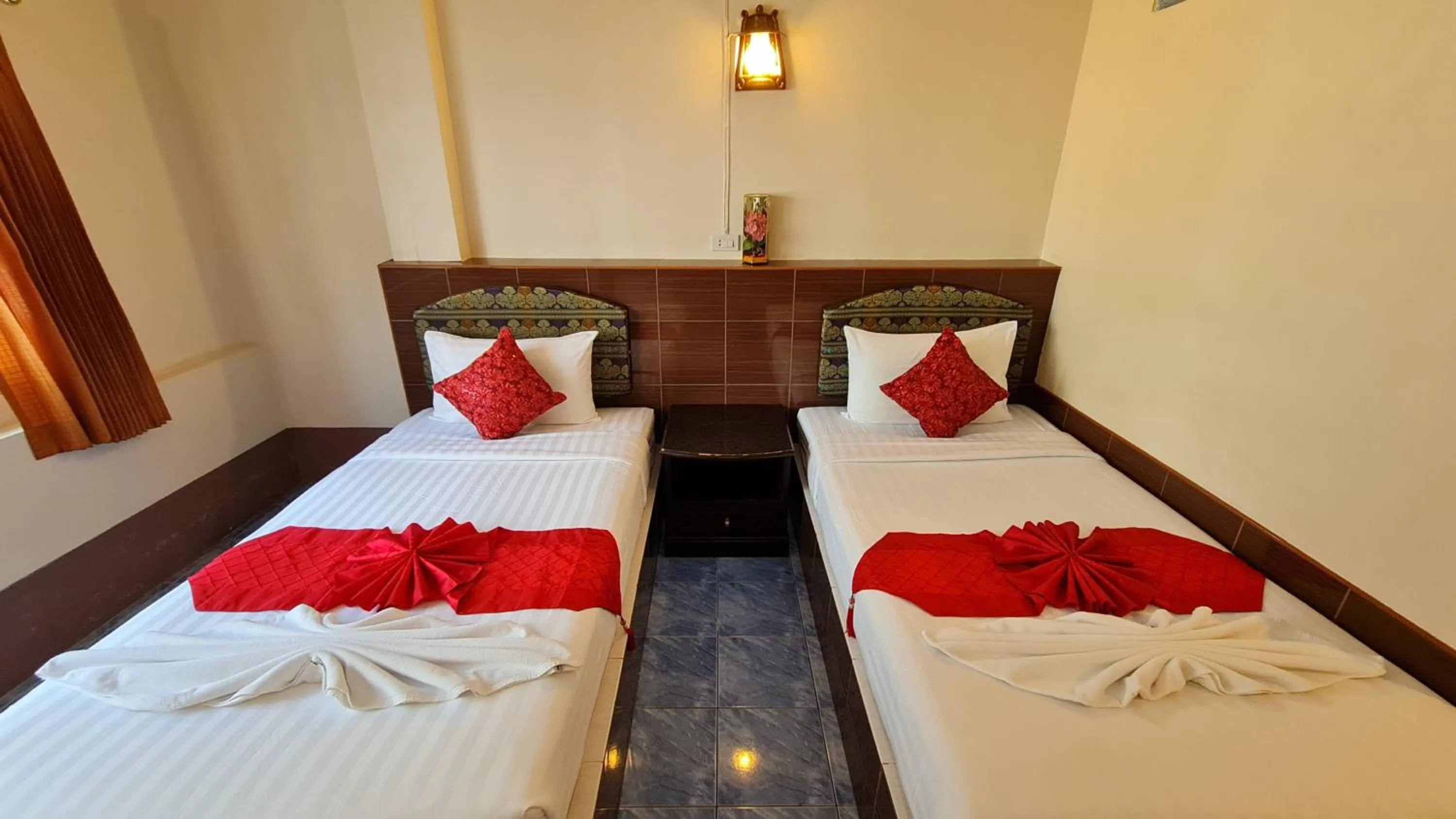 Bed in Vech Guesthouse Patong