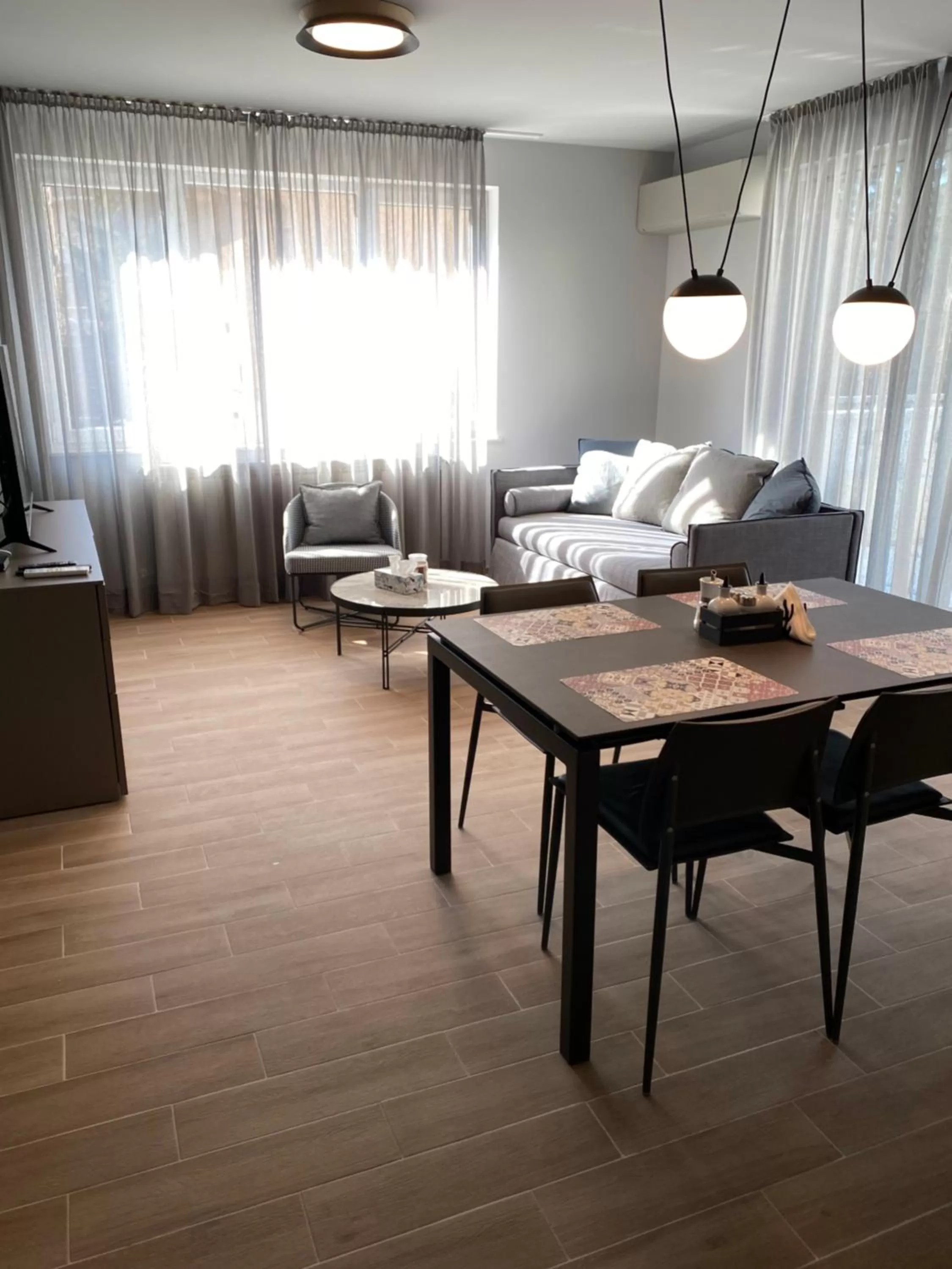 Living room, Dining Area in 7th Sense boutique apartments