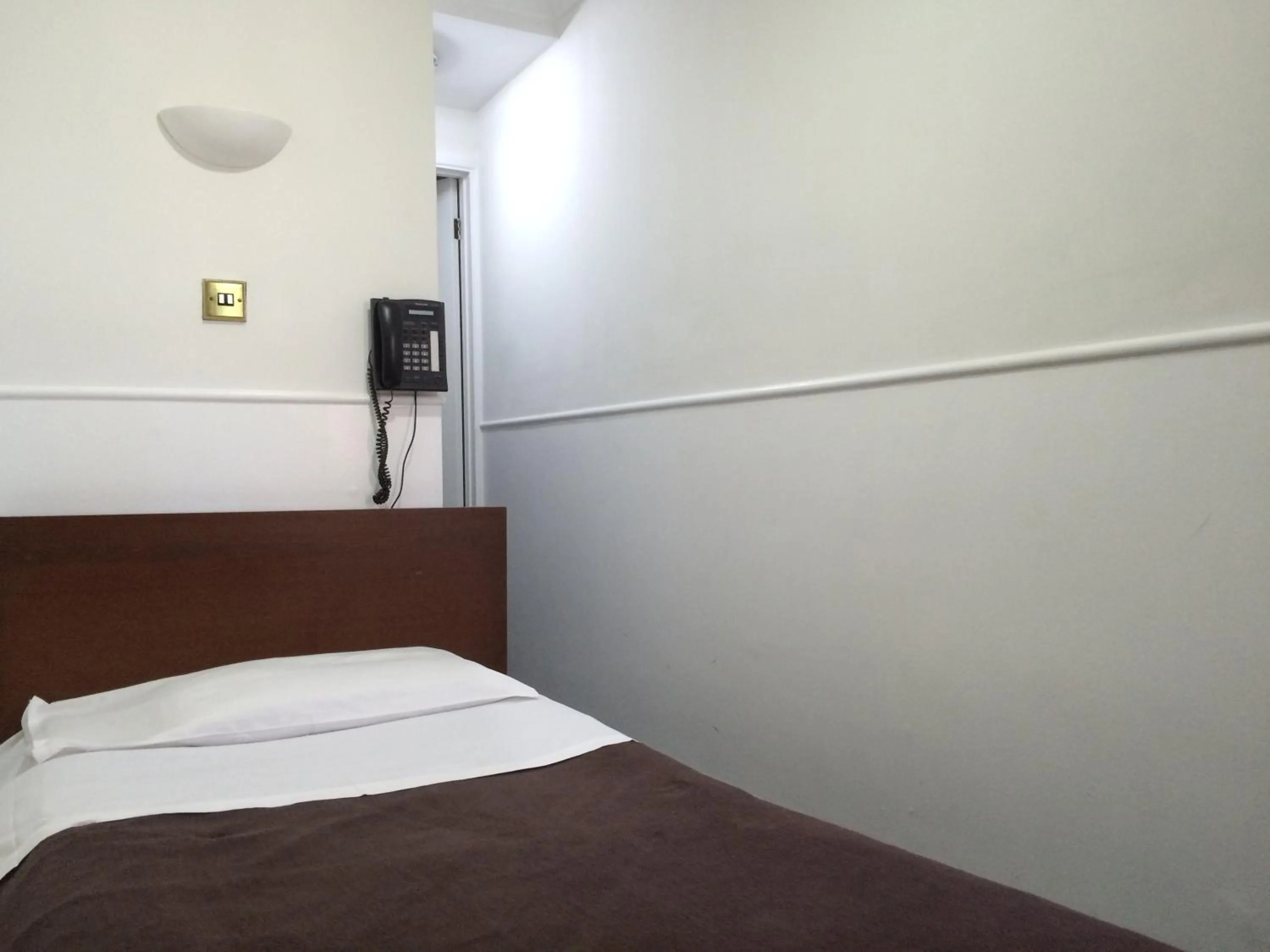 Bed in London Continental Hotel