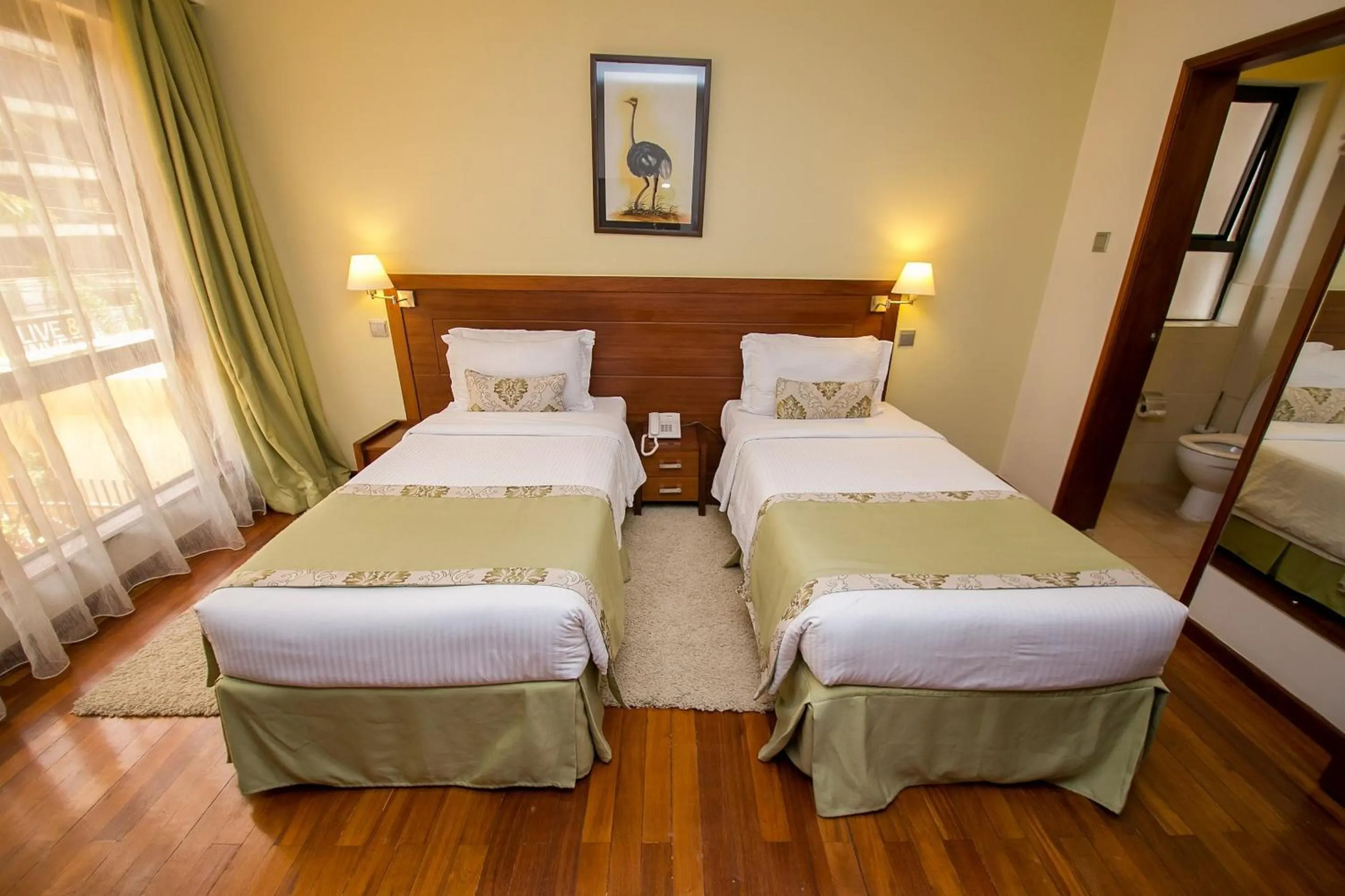 Photo of the whole room, Bed in Waridi Paradise Hotel and Suites
