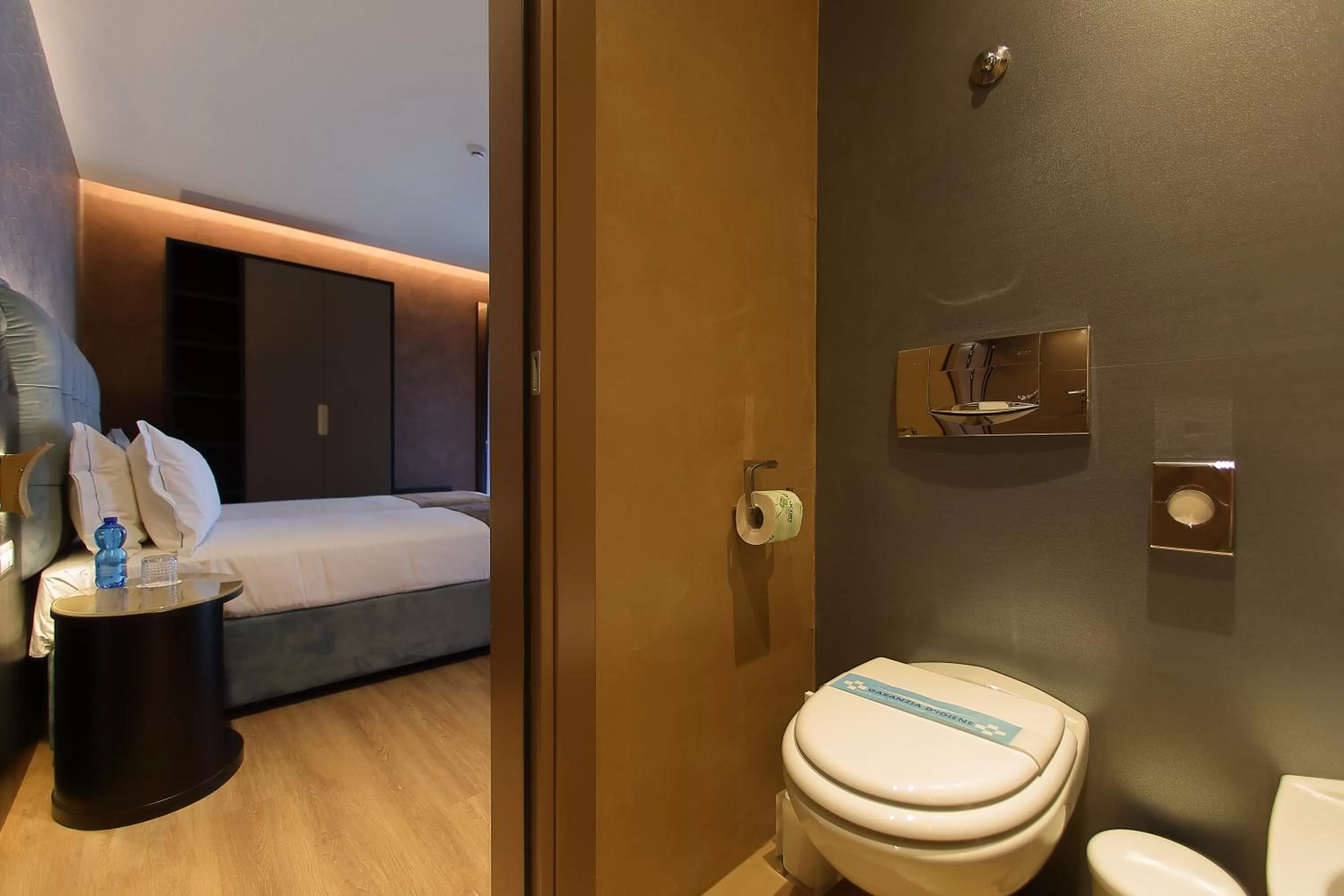 Toilet, Bed in Hotel Bell'arrivo by Dori