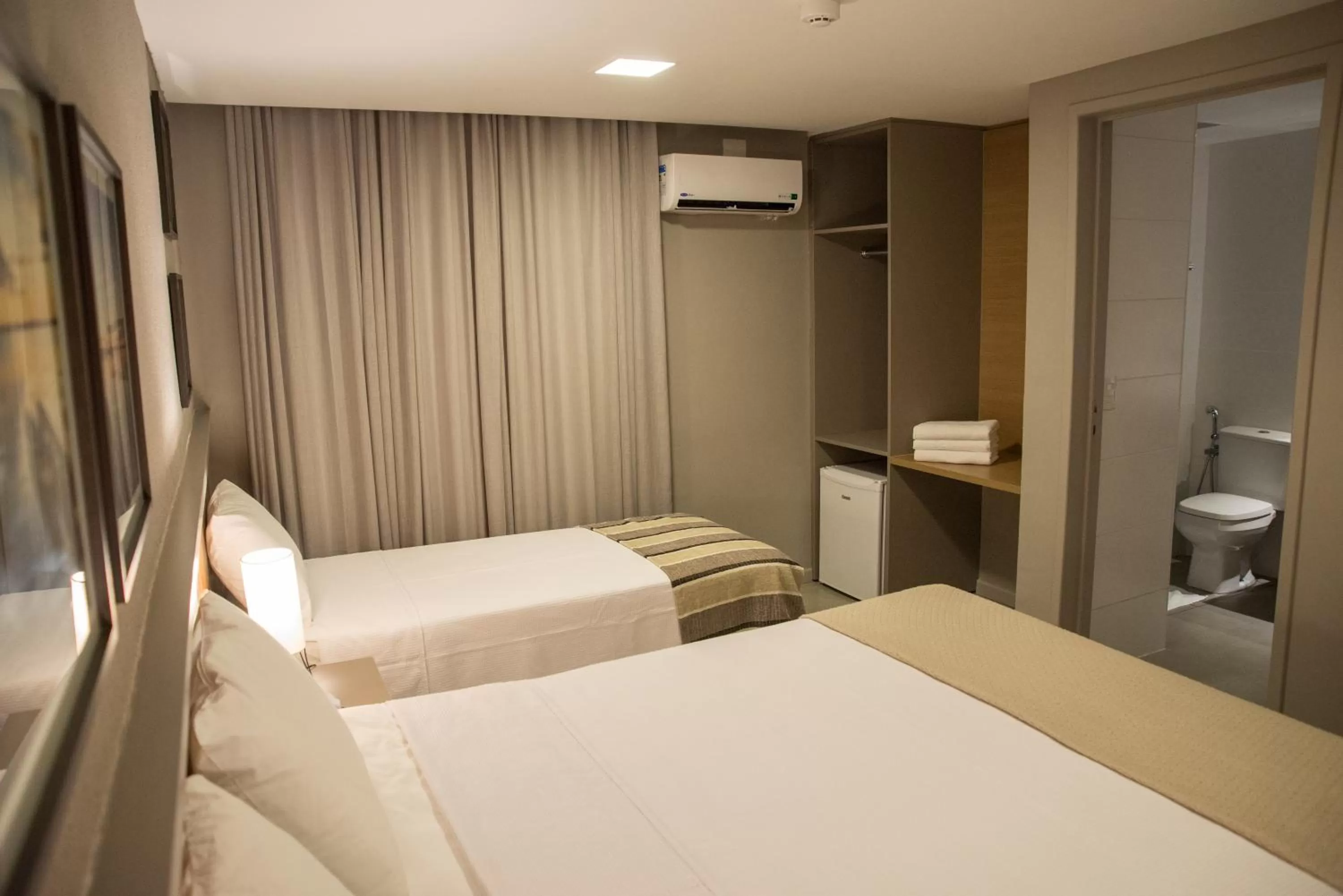 Photo of the whole room, Bed in Amenit Hotel