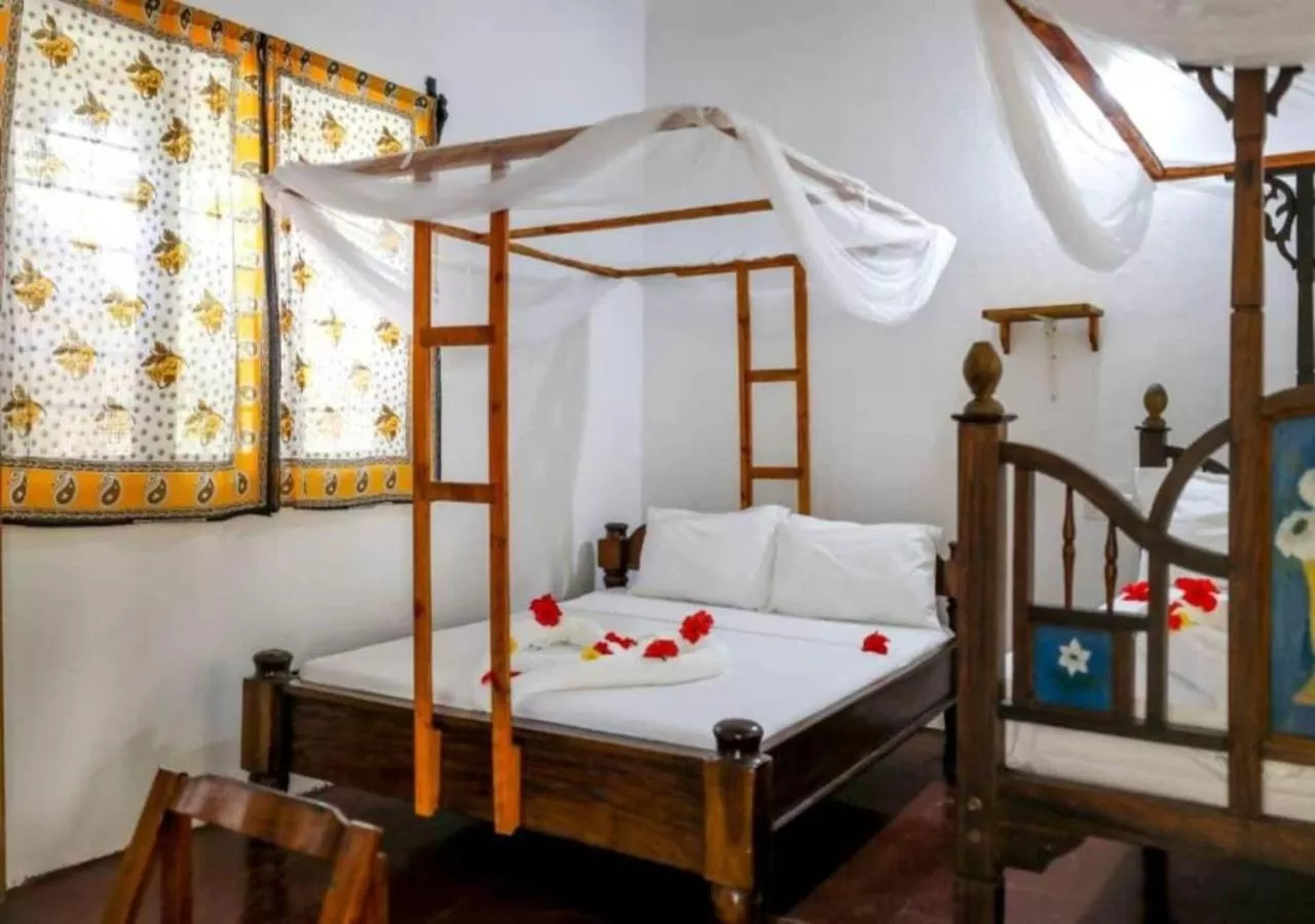 Photo of the whole room, Bed in Mobydick Bungalow Nungwi