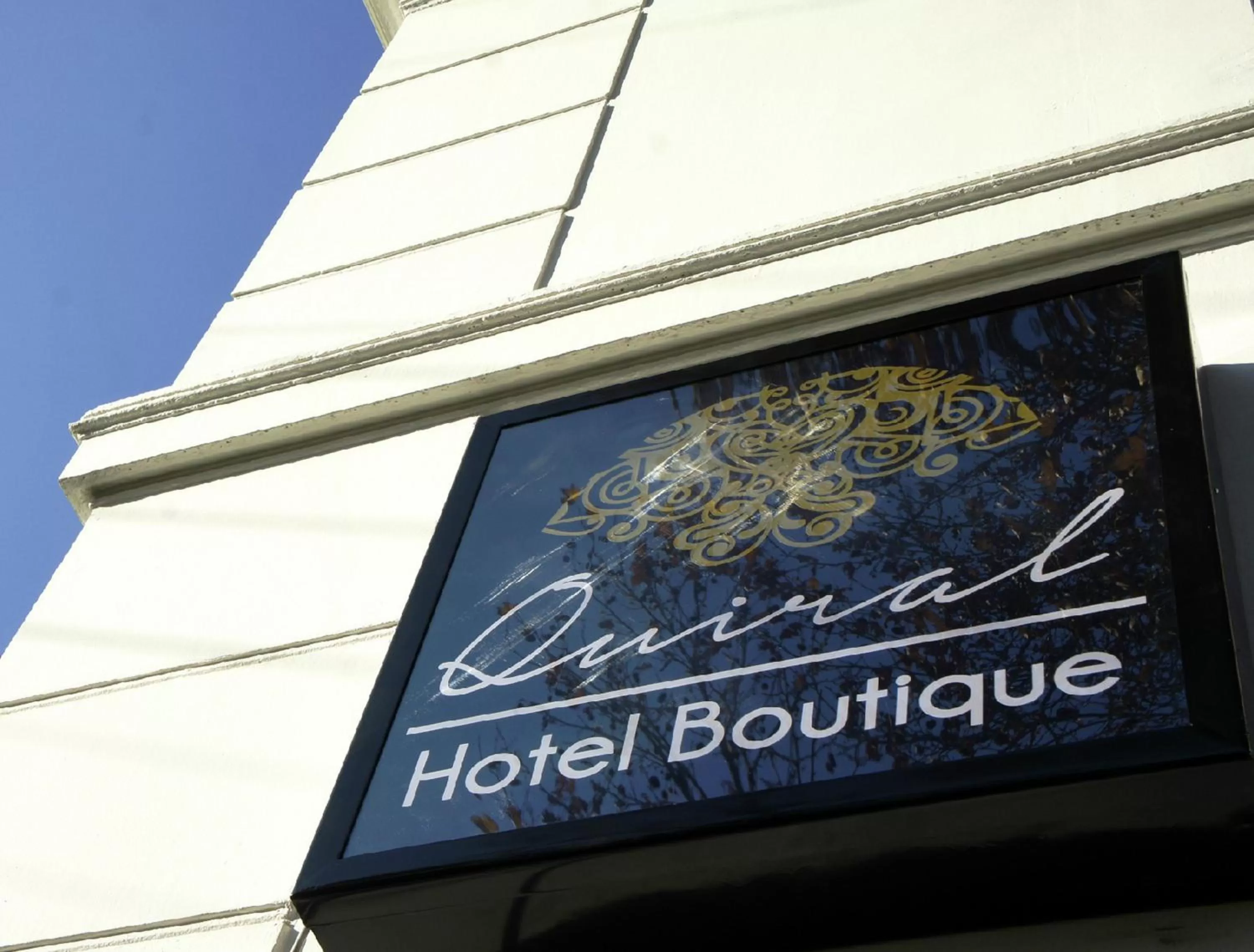 Property logo or sign in Quiral Hotel Boutique