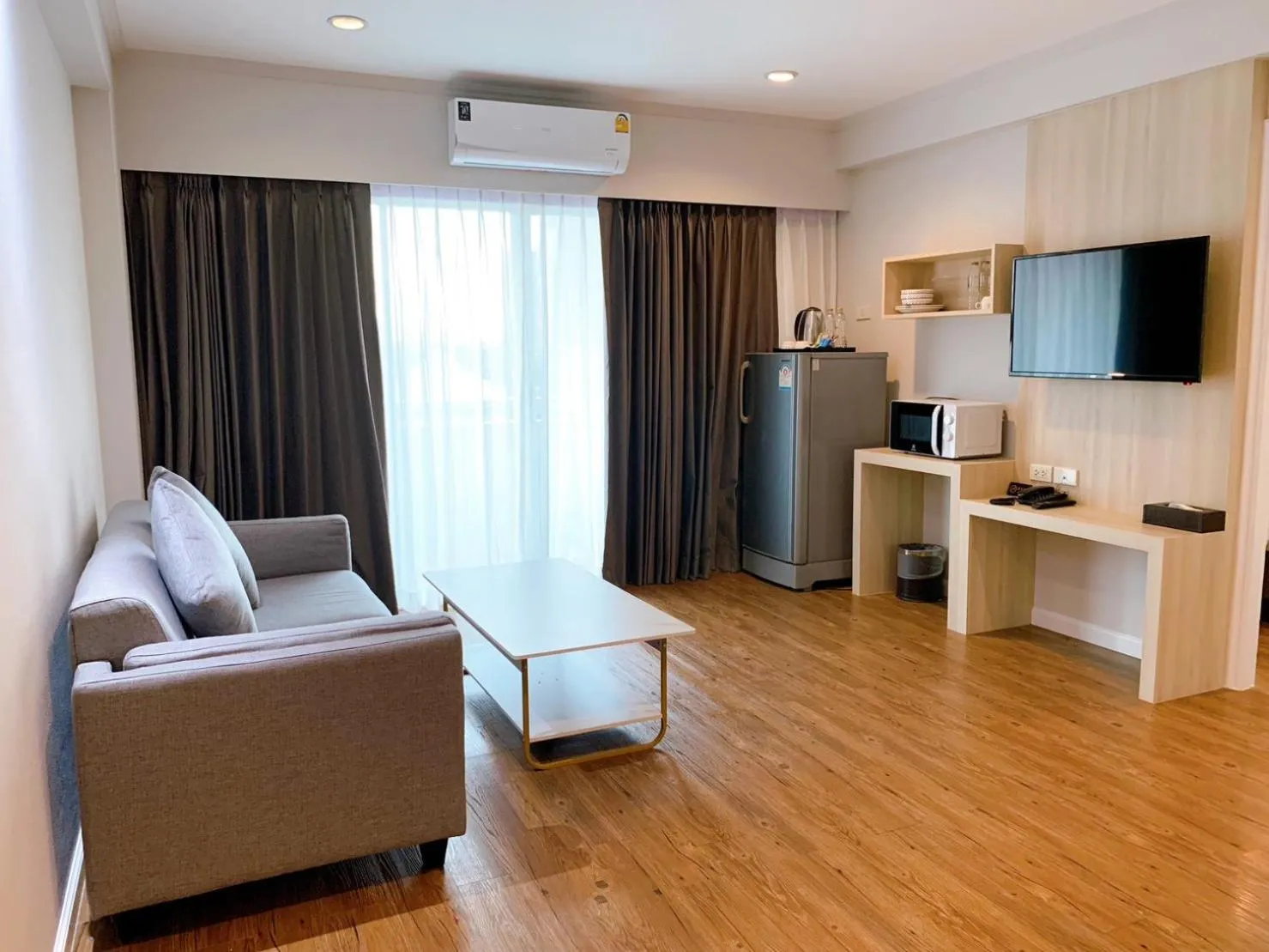 Living room in Miloft Sathorn Hotel - SHA Plus Certified