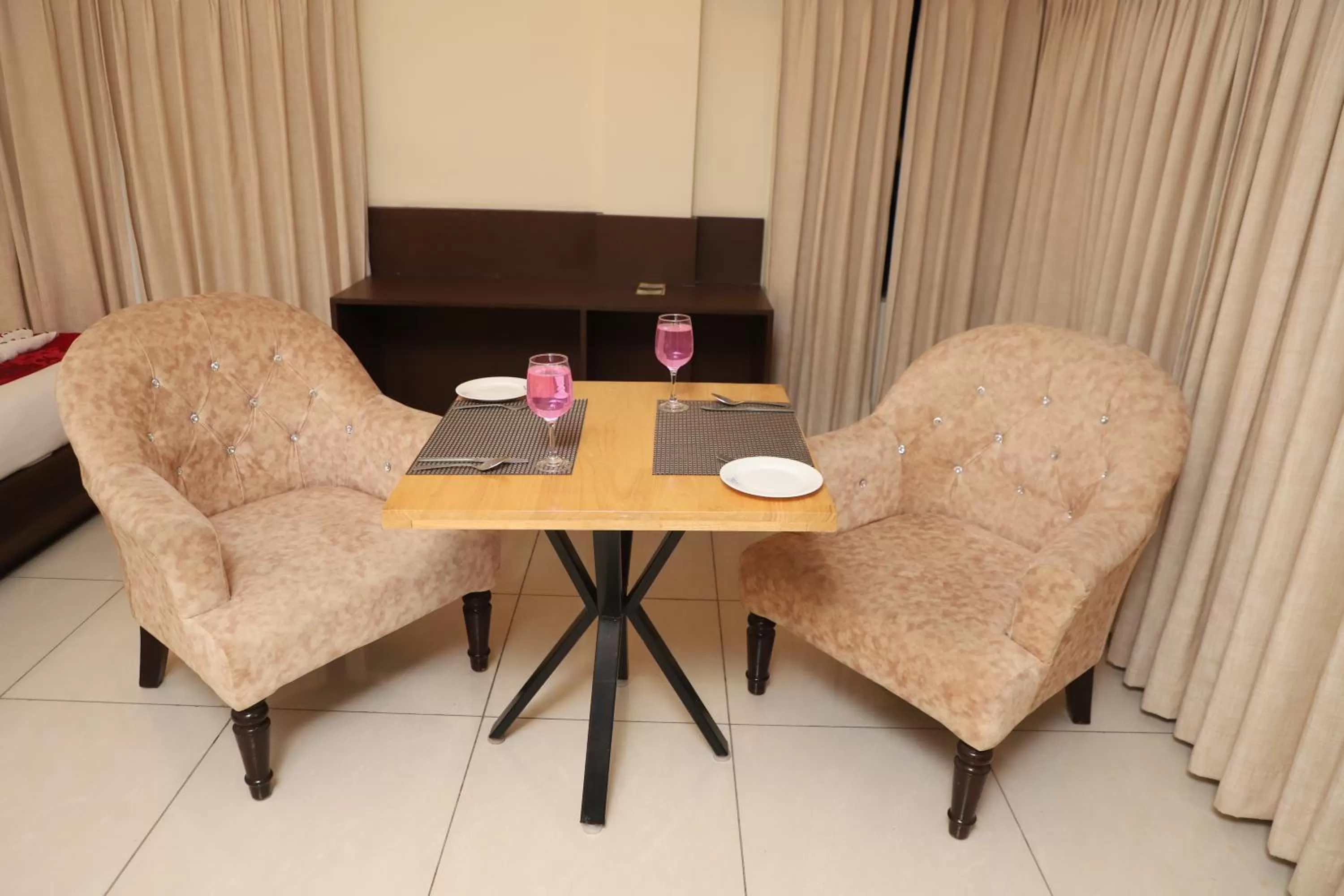 Seating area in Indira Nikunj Rubystone Exotic