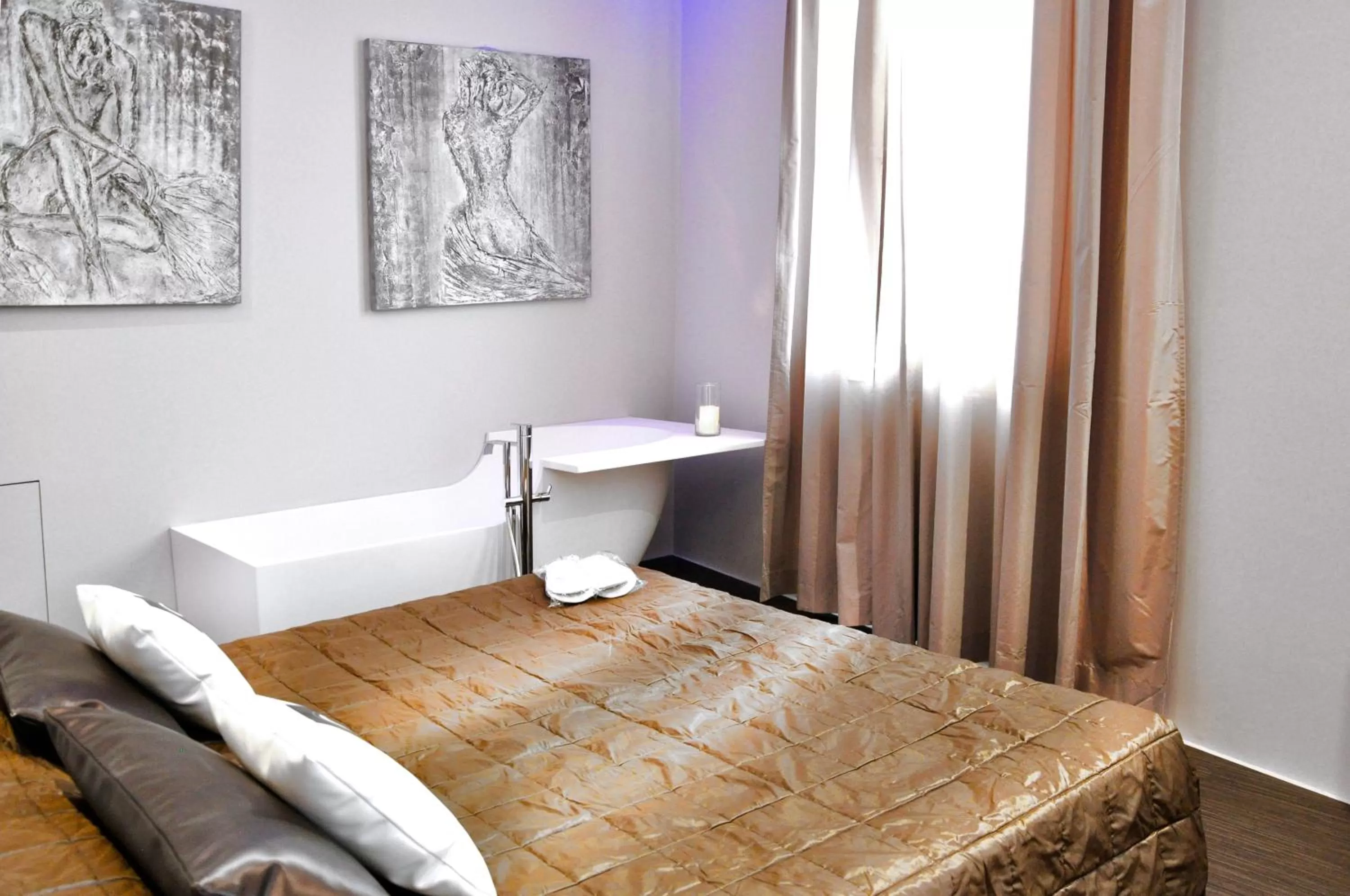 Bed in Le Camp Suite & Spa