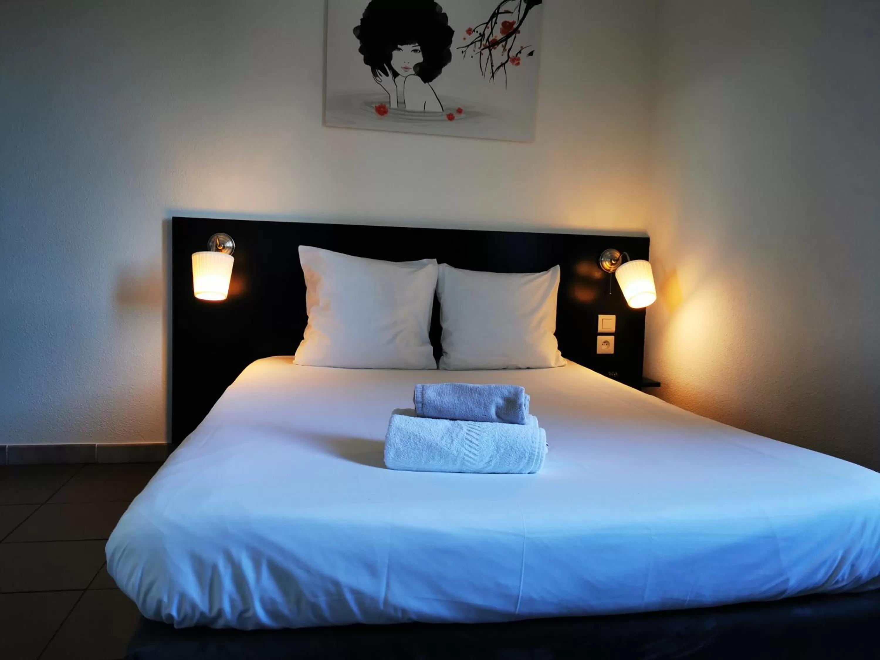 Bed in Hôtel Le Ponson