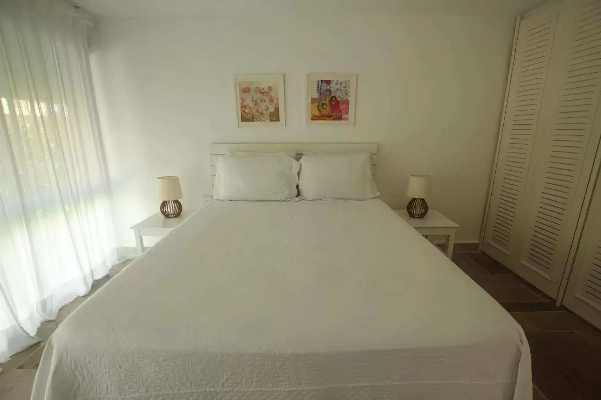 Bed in Guest House Guarujá