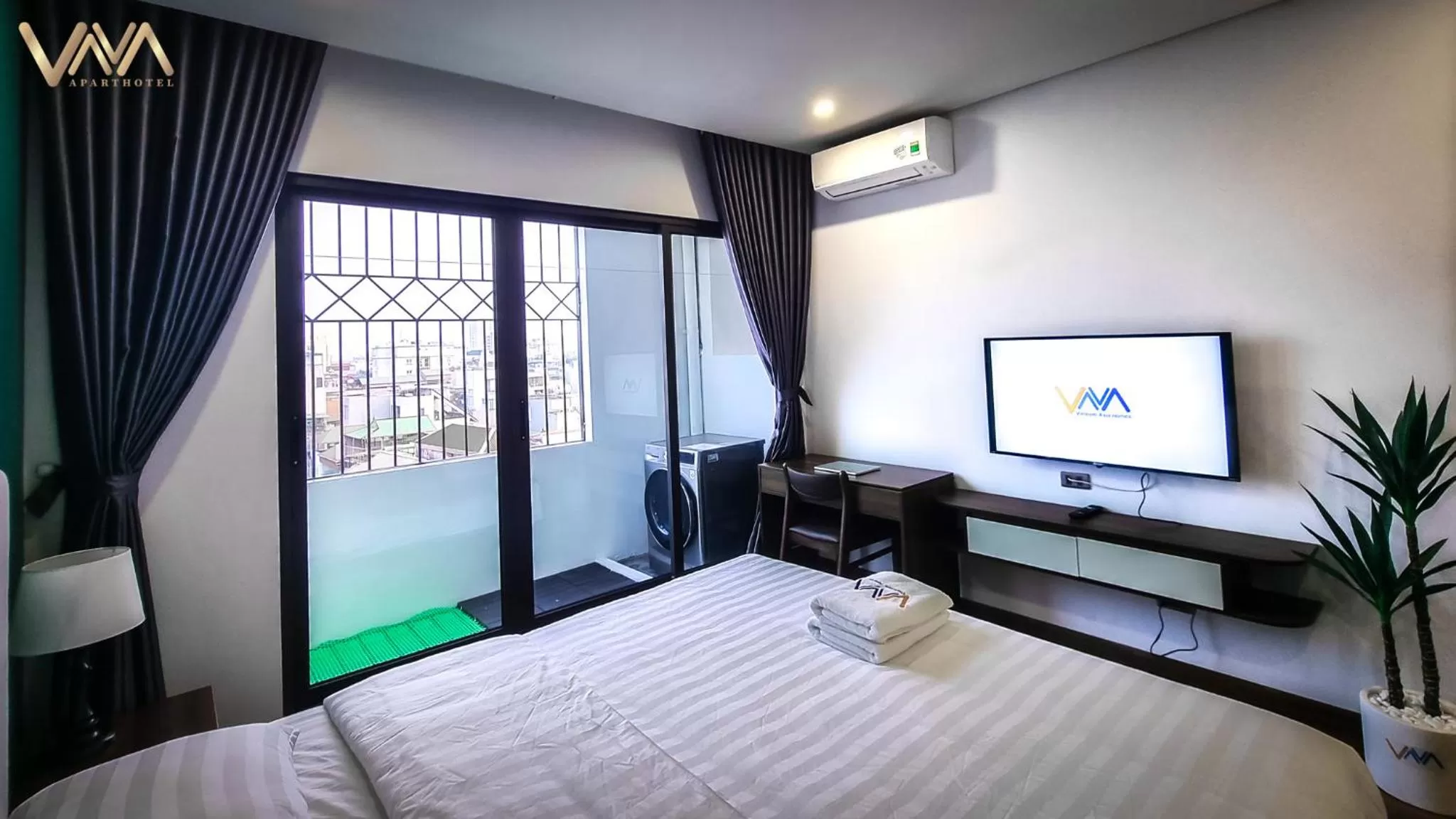 Living room, Bed in VNAHOMES APARTHOTEL