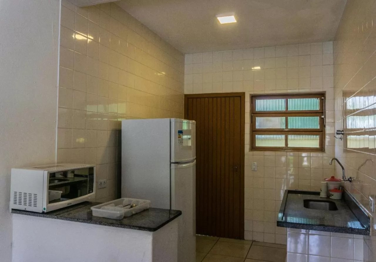 Kitchen or kitchenette, Kitchen/Kitchenette in Pousada Ilha Vitoria