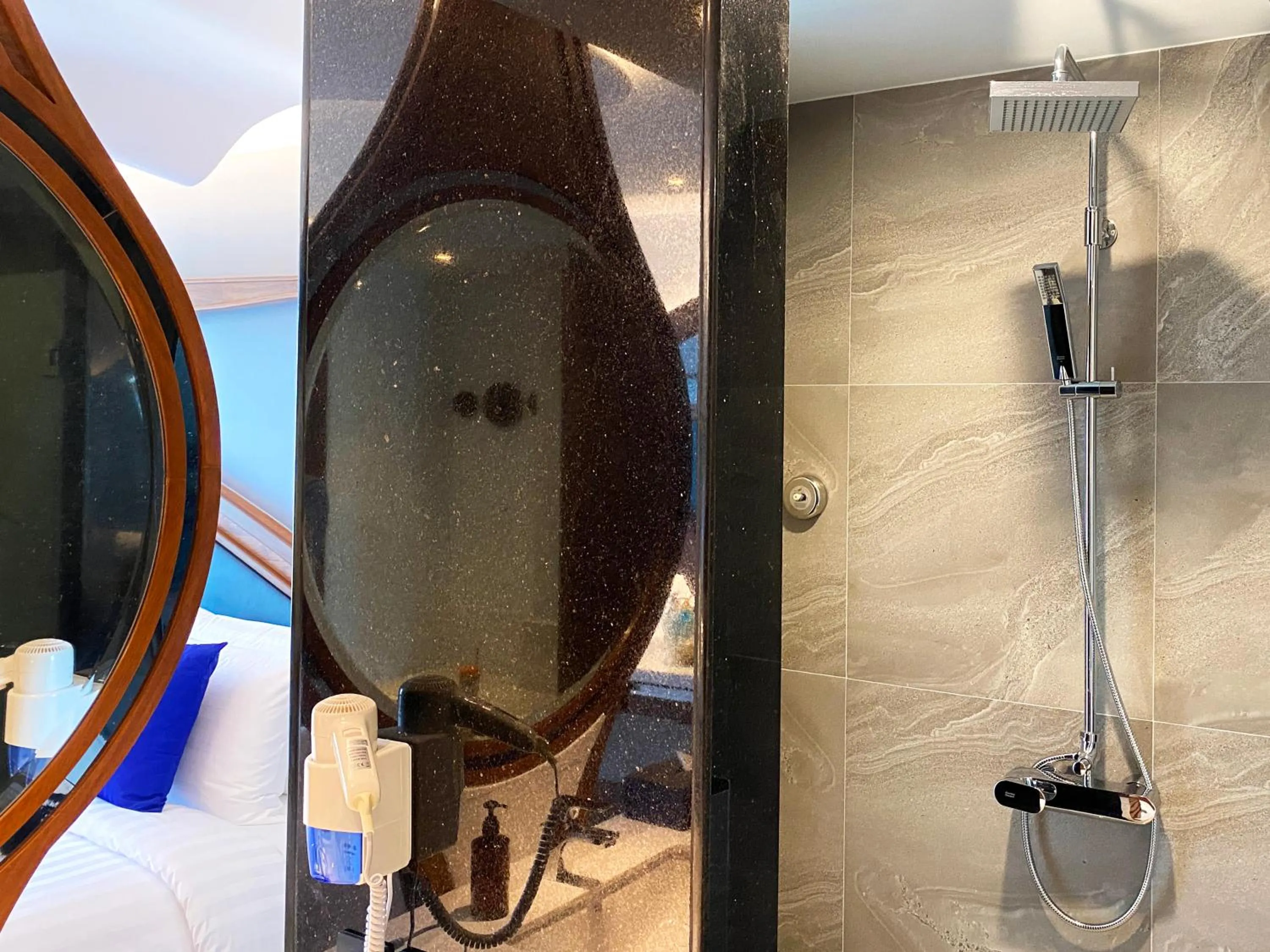 Bathroom in The Oceanic Sportel Phuket - SHA Extra Plus