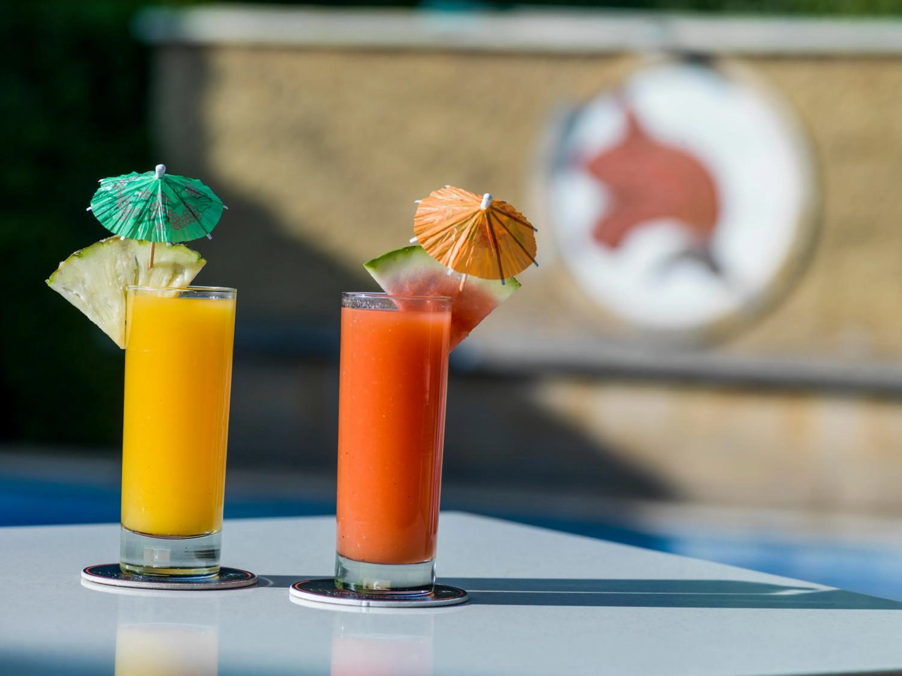 Property logo or sign in African Tulip Hotel