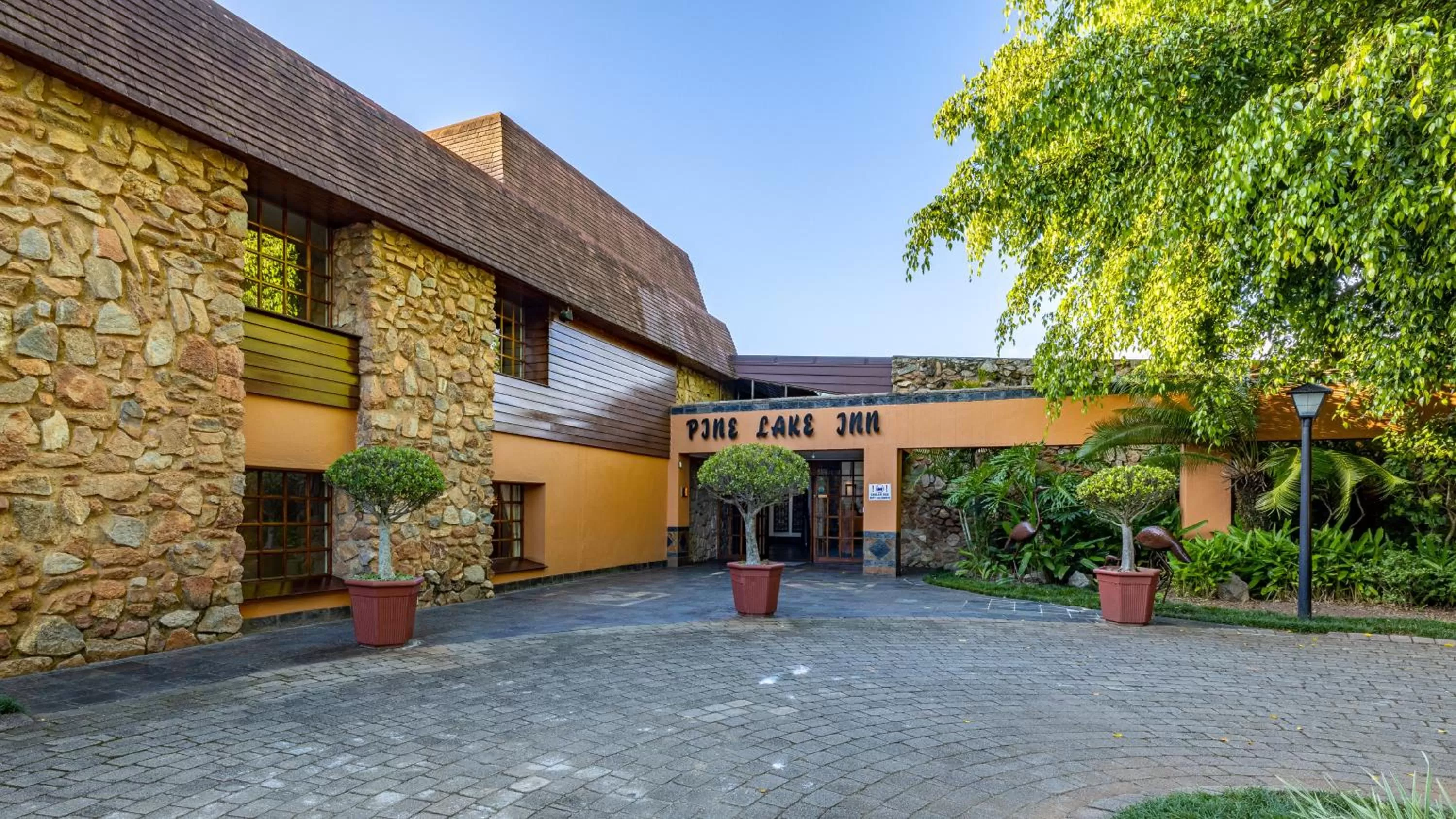 Property building in African Sky Hotels - Pine Lake Inn
