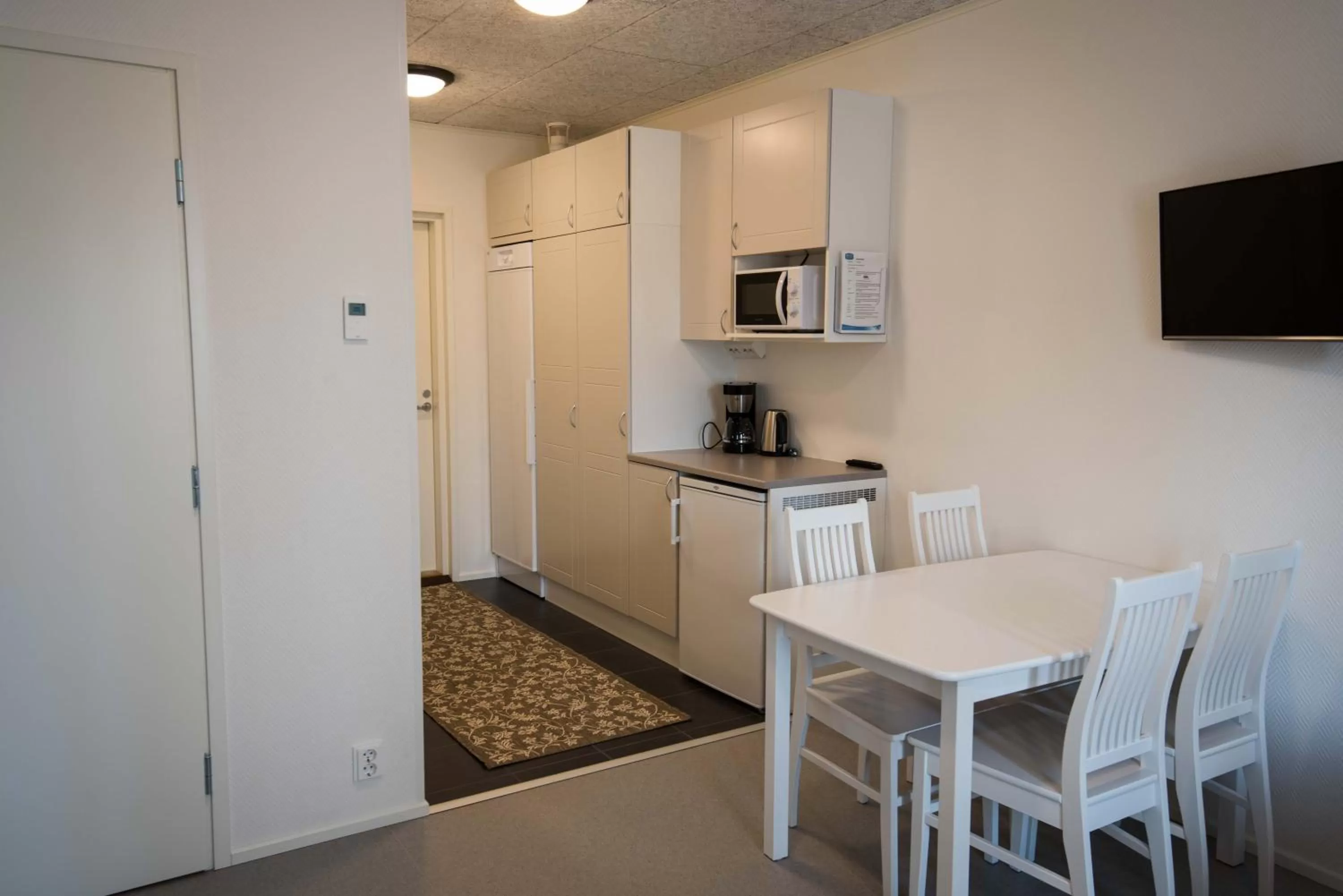 Dining area, Kitchen/Kitchenette in Kuortaneen Urheiluopisto