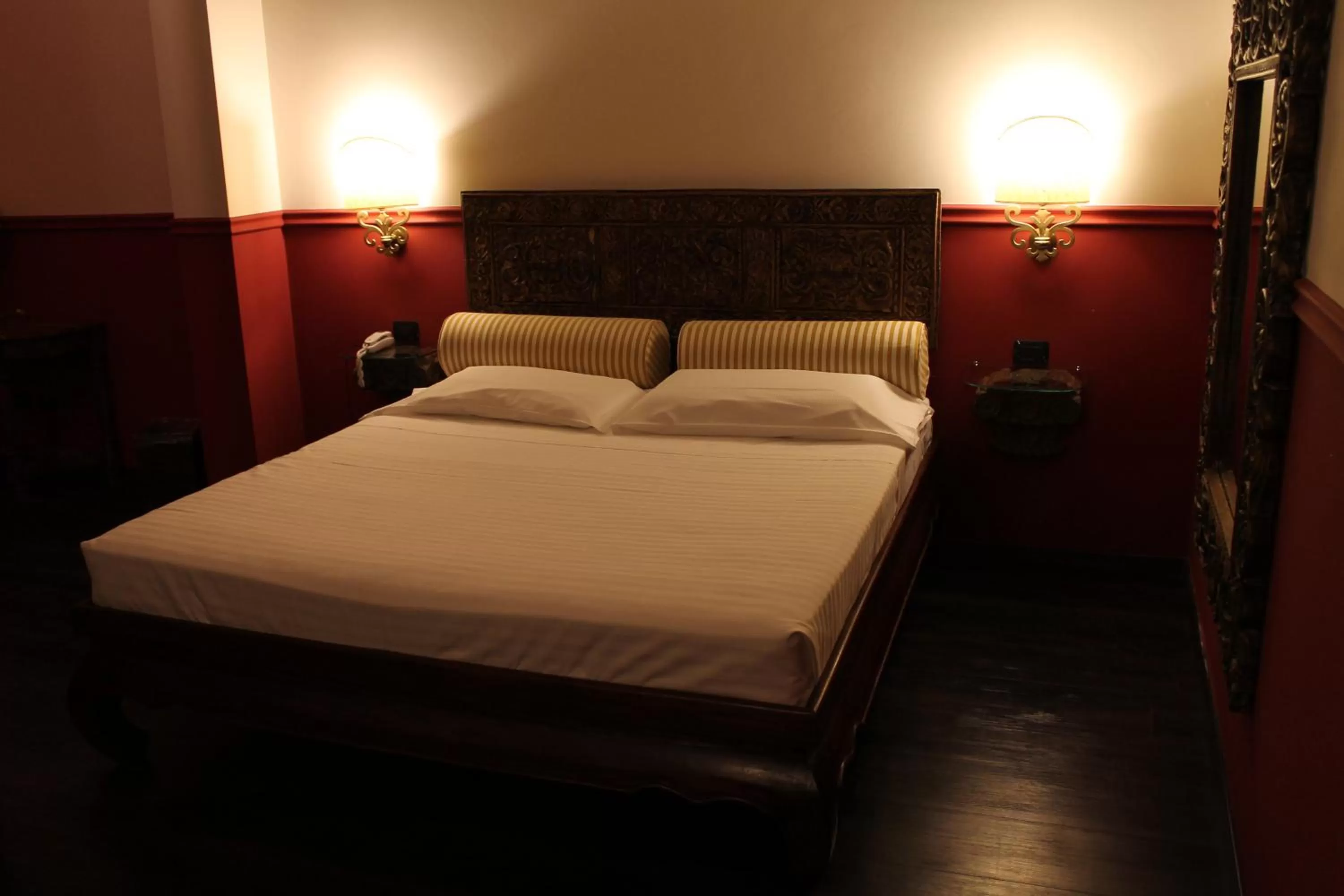 Bed in Hotel Don Carlo