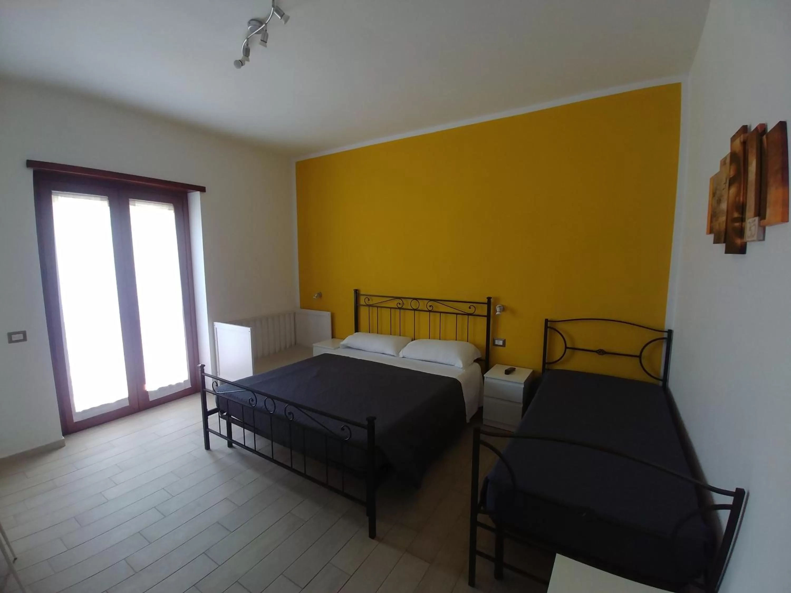 Bed in Bonsai Bed & Breakfast