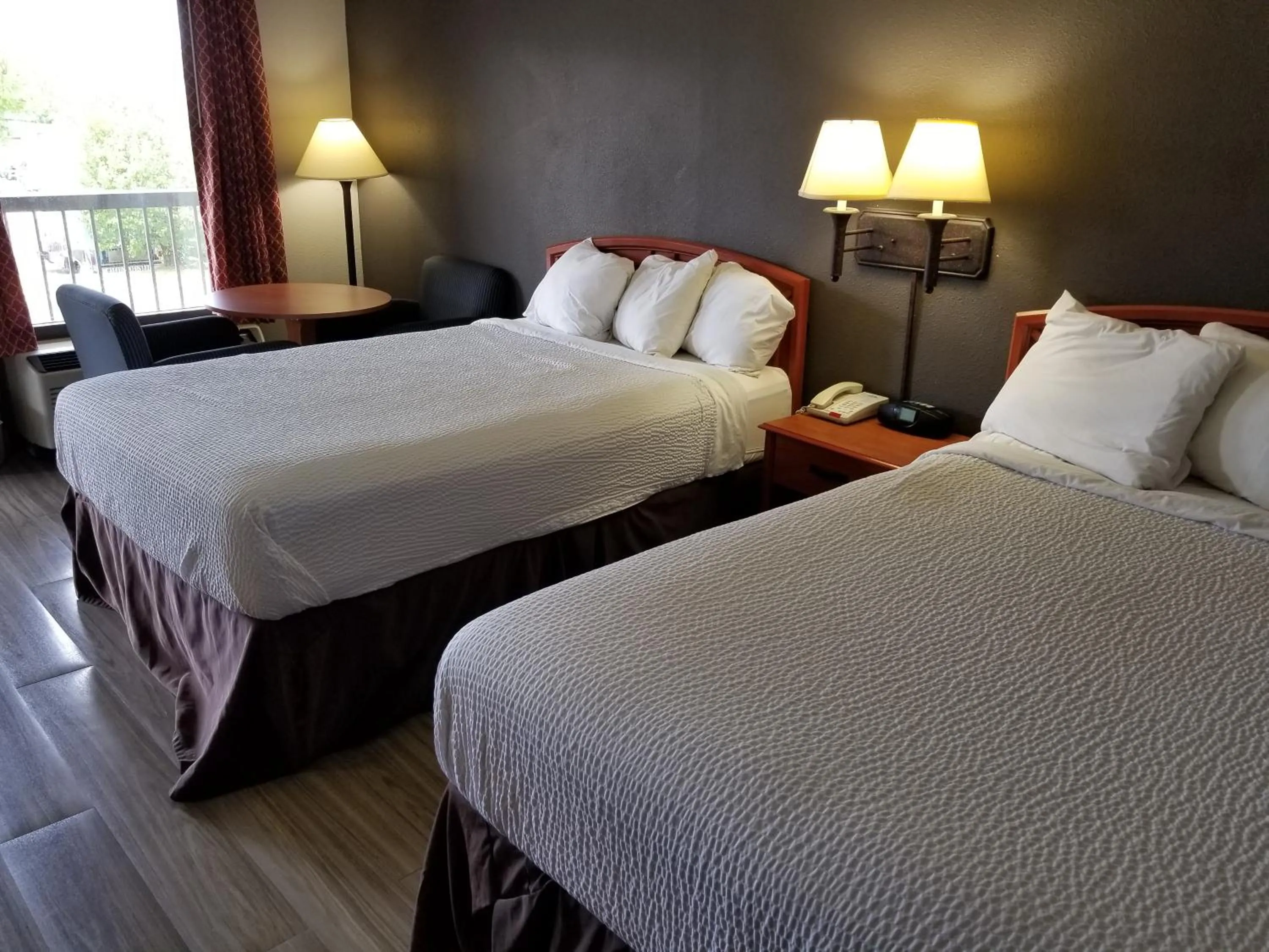 Bed in Days Inn by Wyndham Wilson