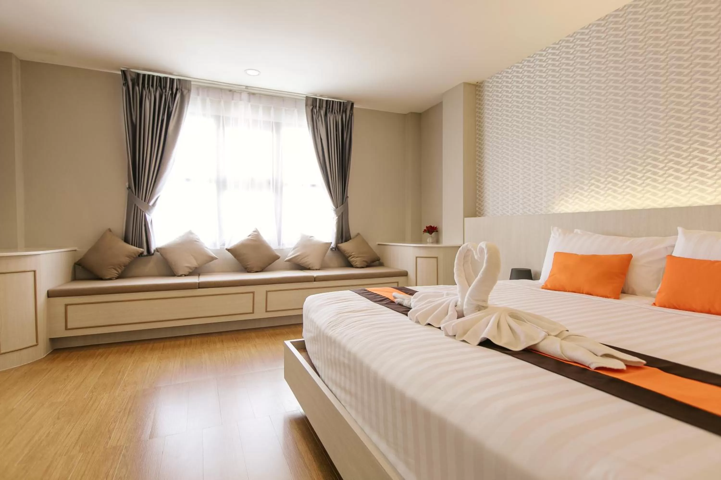 Bed in De Hug Hotel & Residence