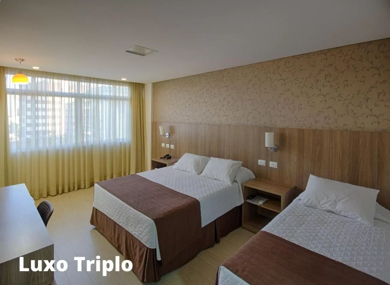 Bed in Foz Presidente Comfort Hotel