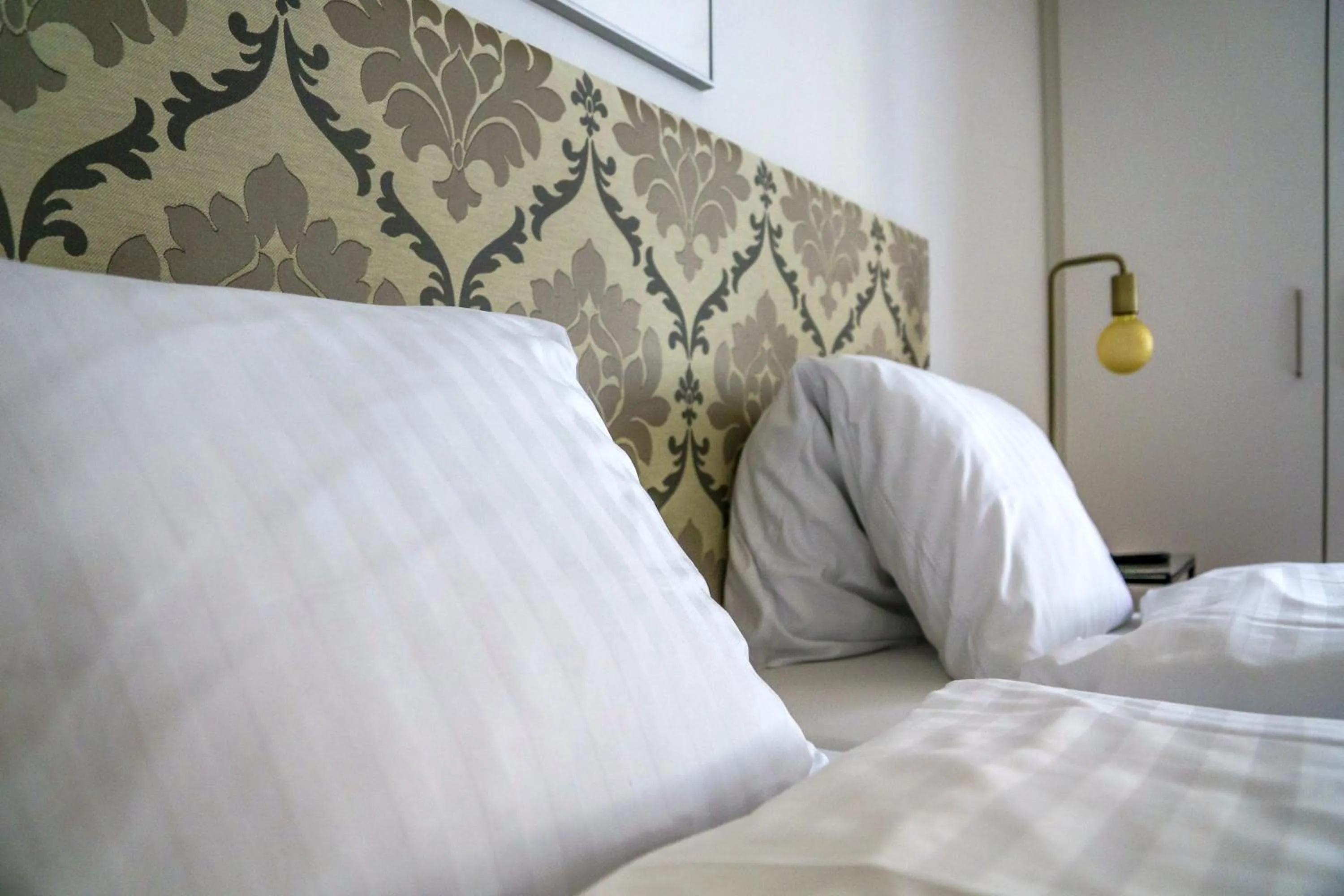 Bed in Hotel Vadian Garni