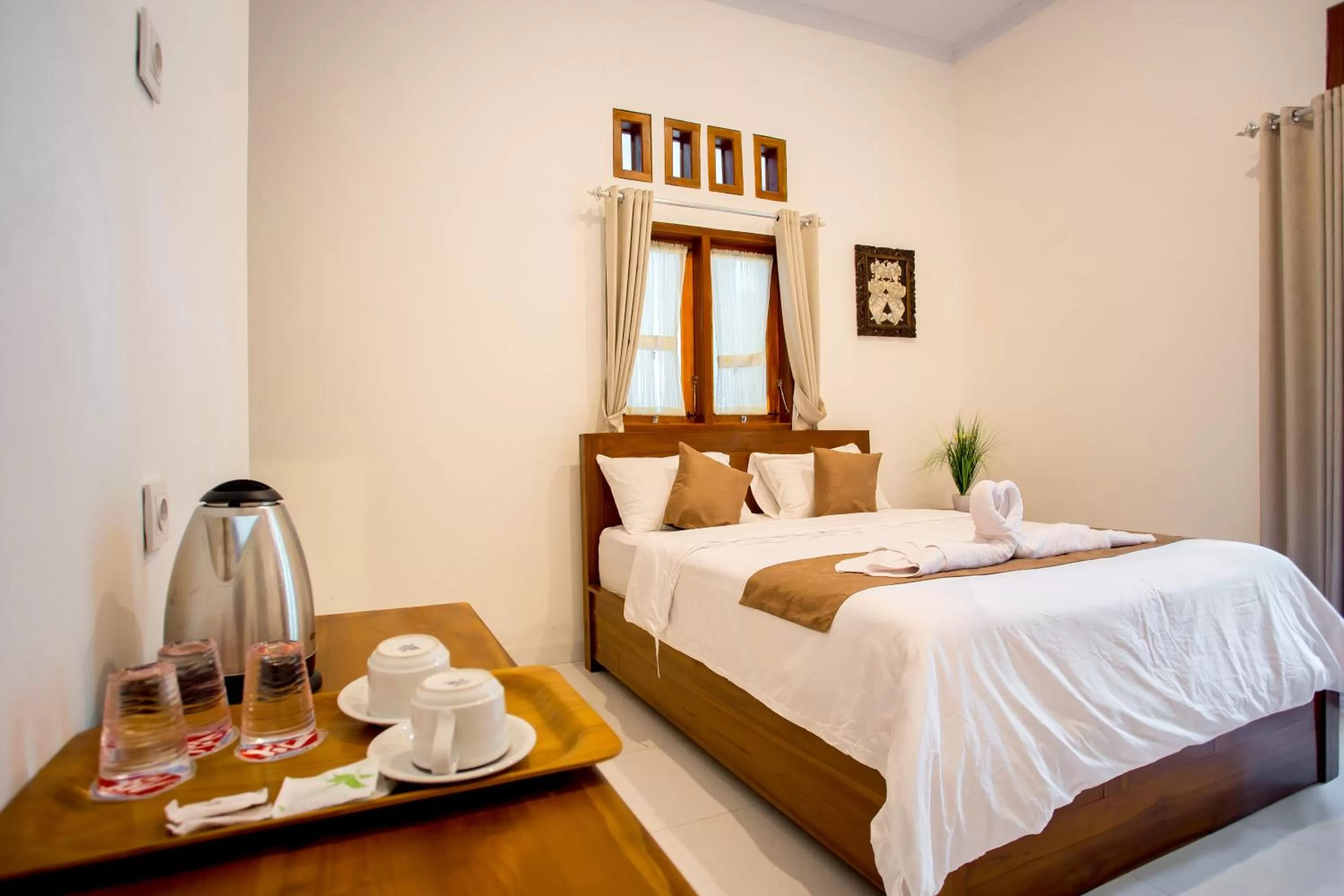 Bed in The Puncak Santhi Inn