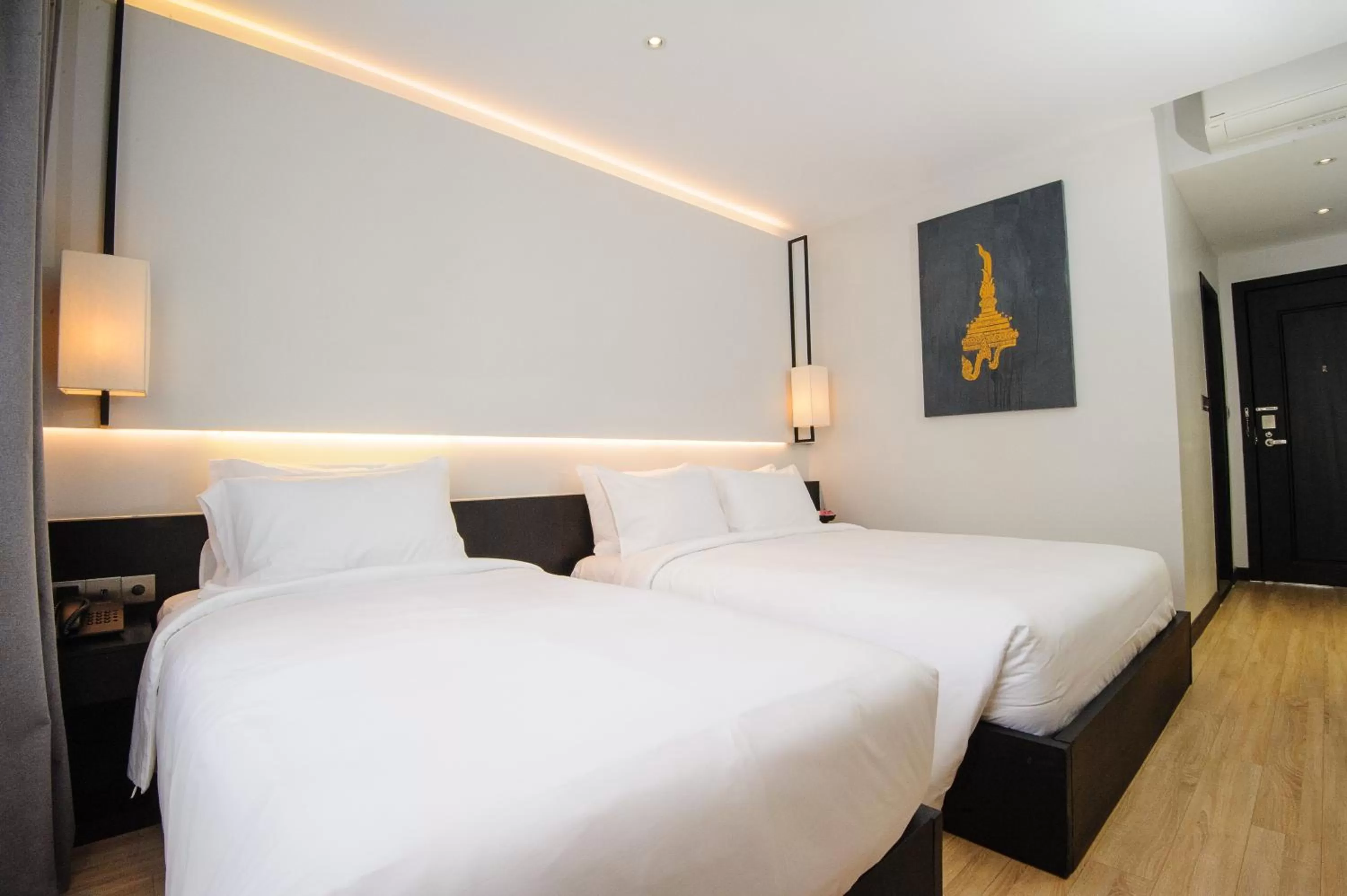 Bed in GLOW PARK HOTEL Grand Royal Palace