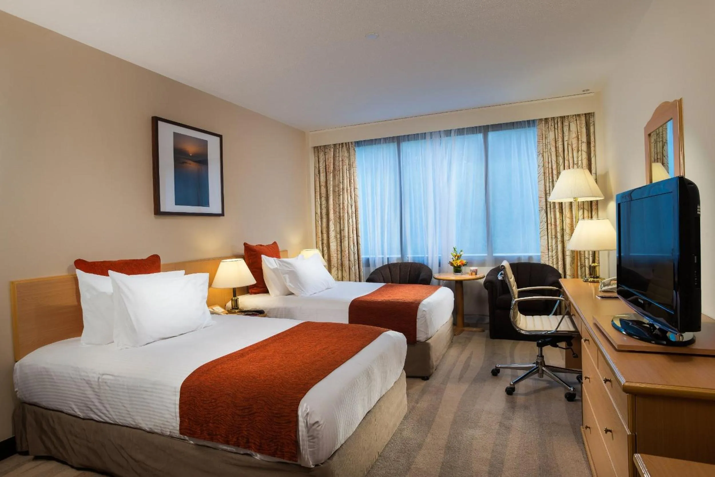 Photo of the whole room, Bed in Crowne Plaza Muscat by IHG